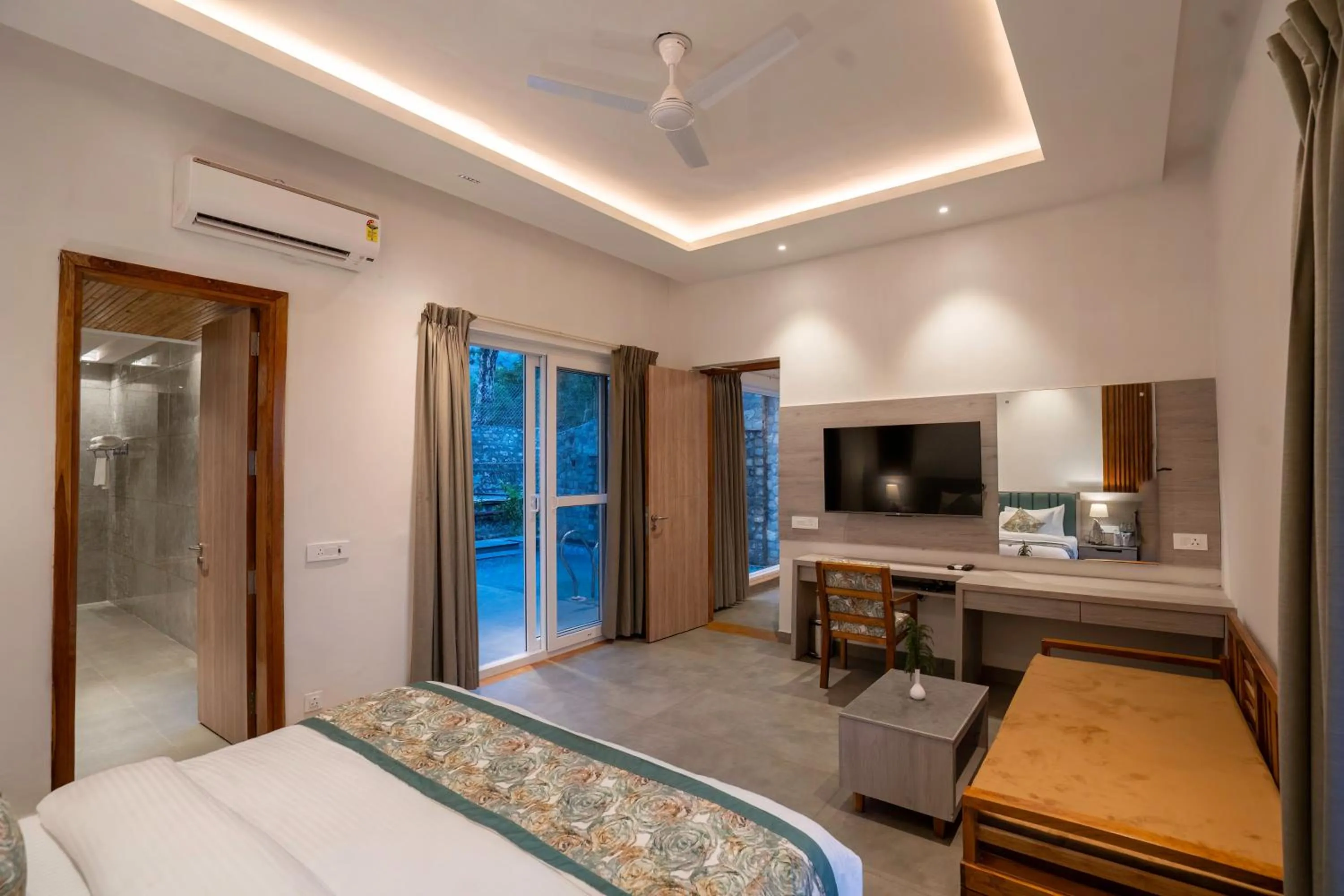 Bed in Evara Spa & Resort