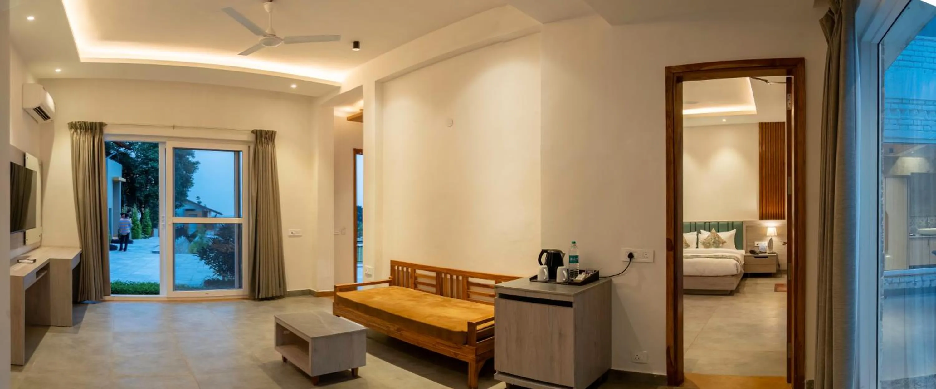 Living room, Bed in Evara Spa & Resort