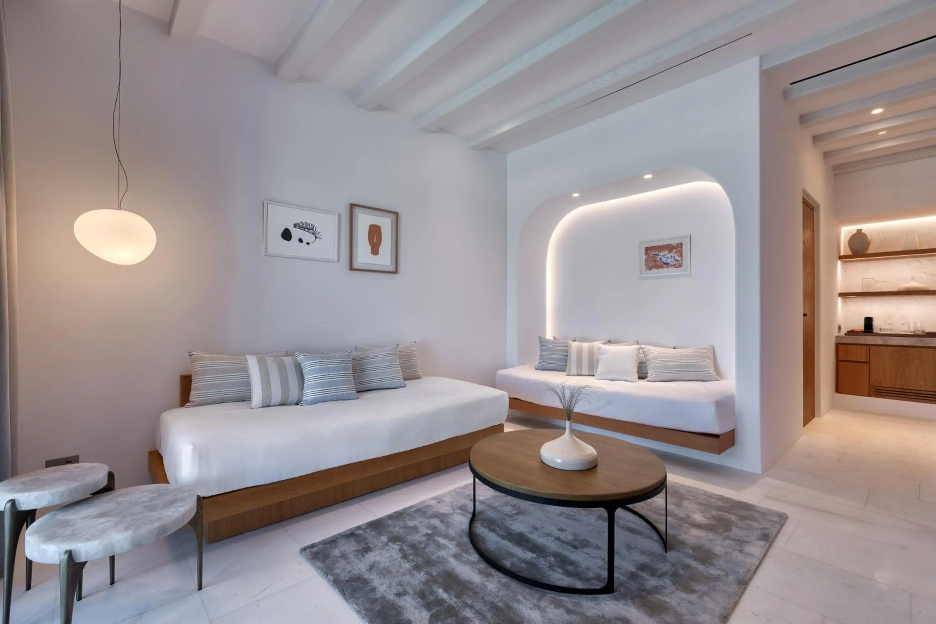 Living room, Bed in Sandblu Santorini, LXR Hotels & Resorts