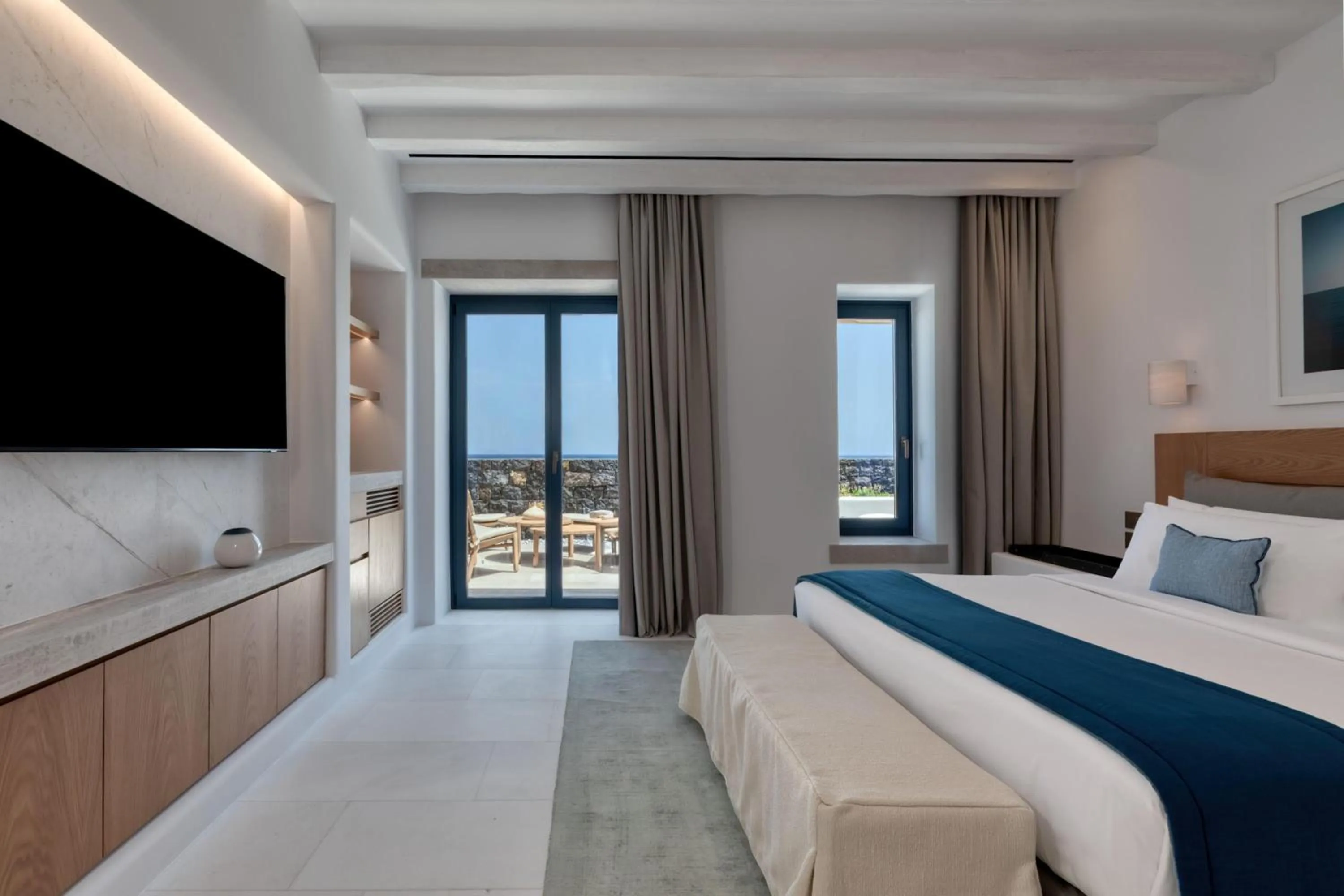 Bed in Sandblu Santorini, LXR Hotels & Resorts