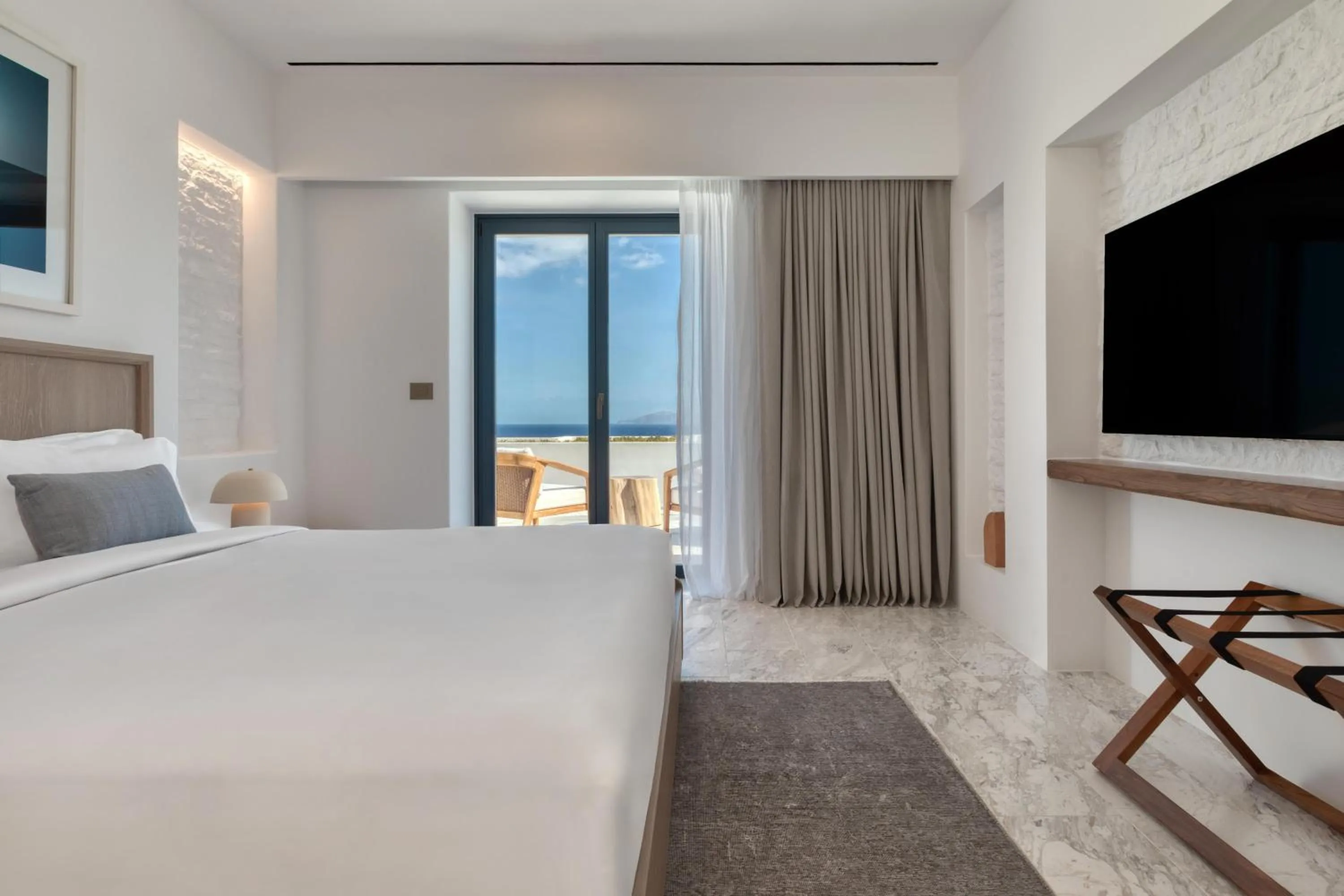 Bed in Sandblu Santorini, LXR Hotels & Resorts