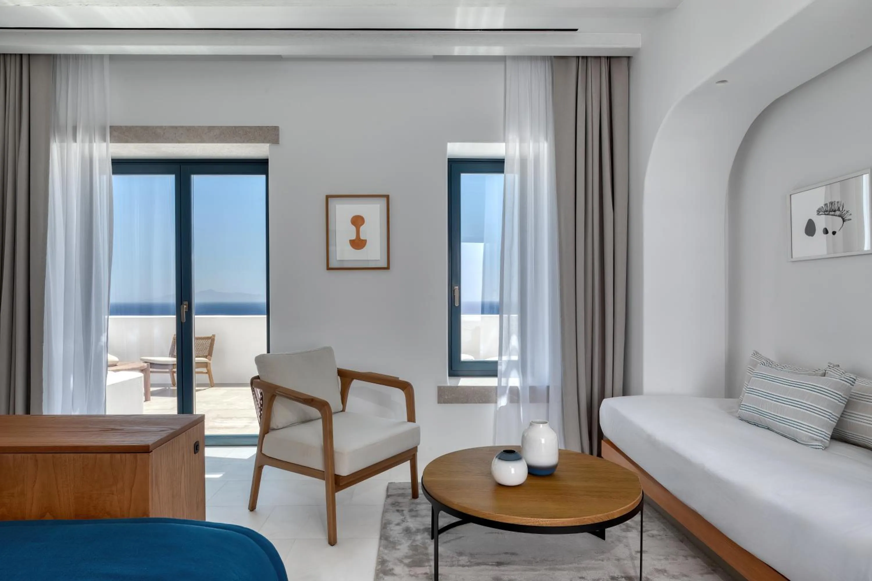 Seating area, Bed in Sandblu Santorini, LXR Hotels & Resorts