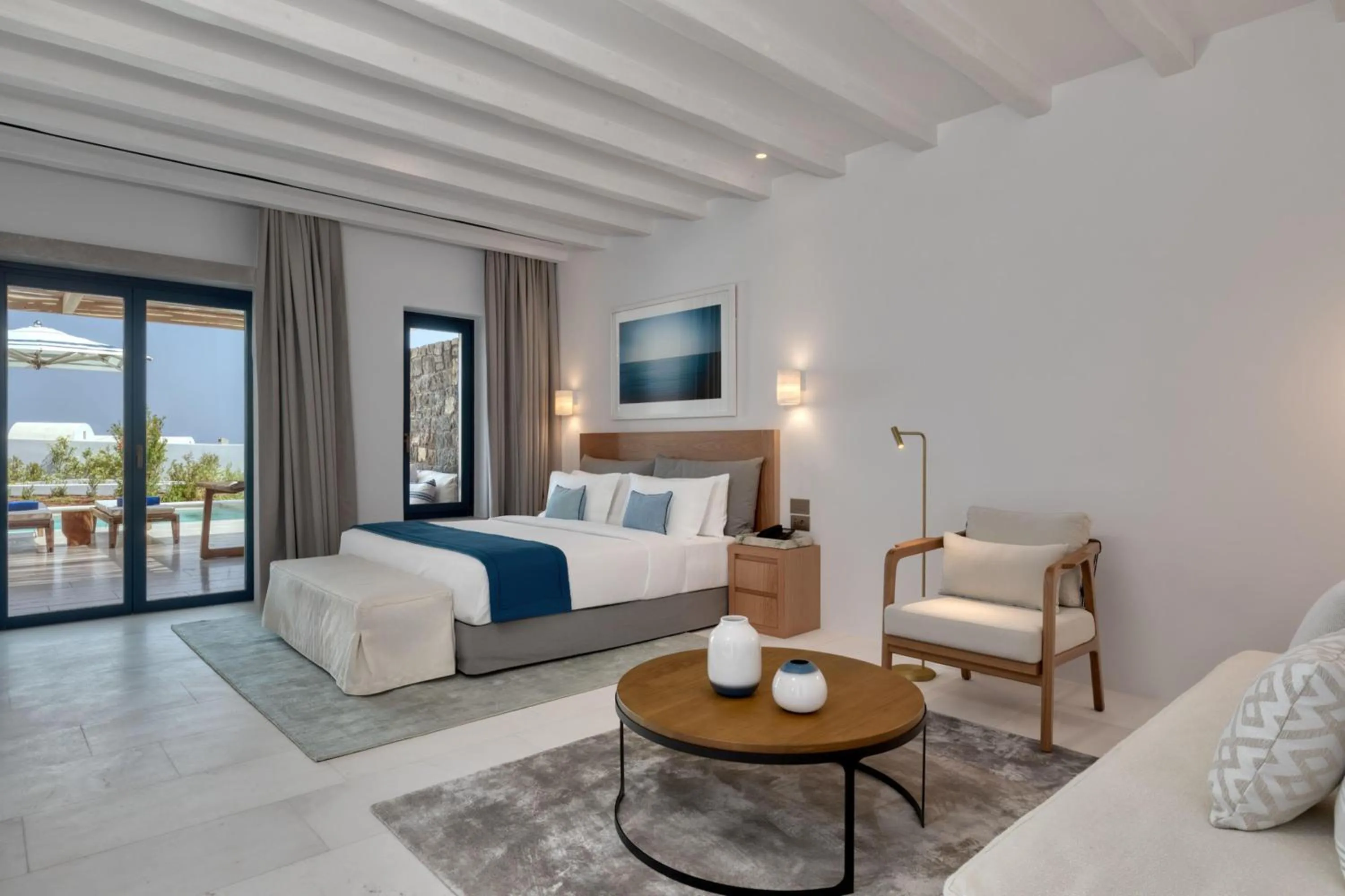 Living room, Bed in Sandblu Santorini, LXR Hotels & Resorts