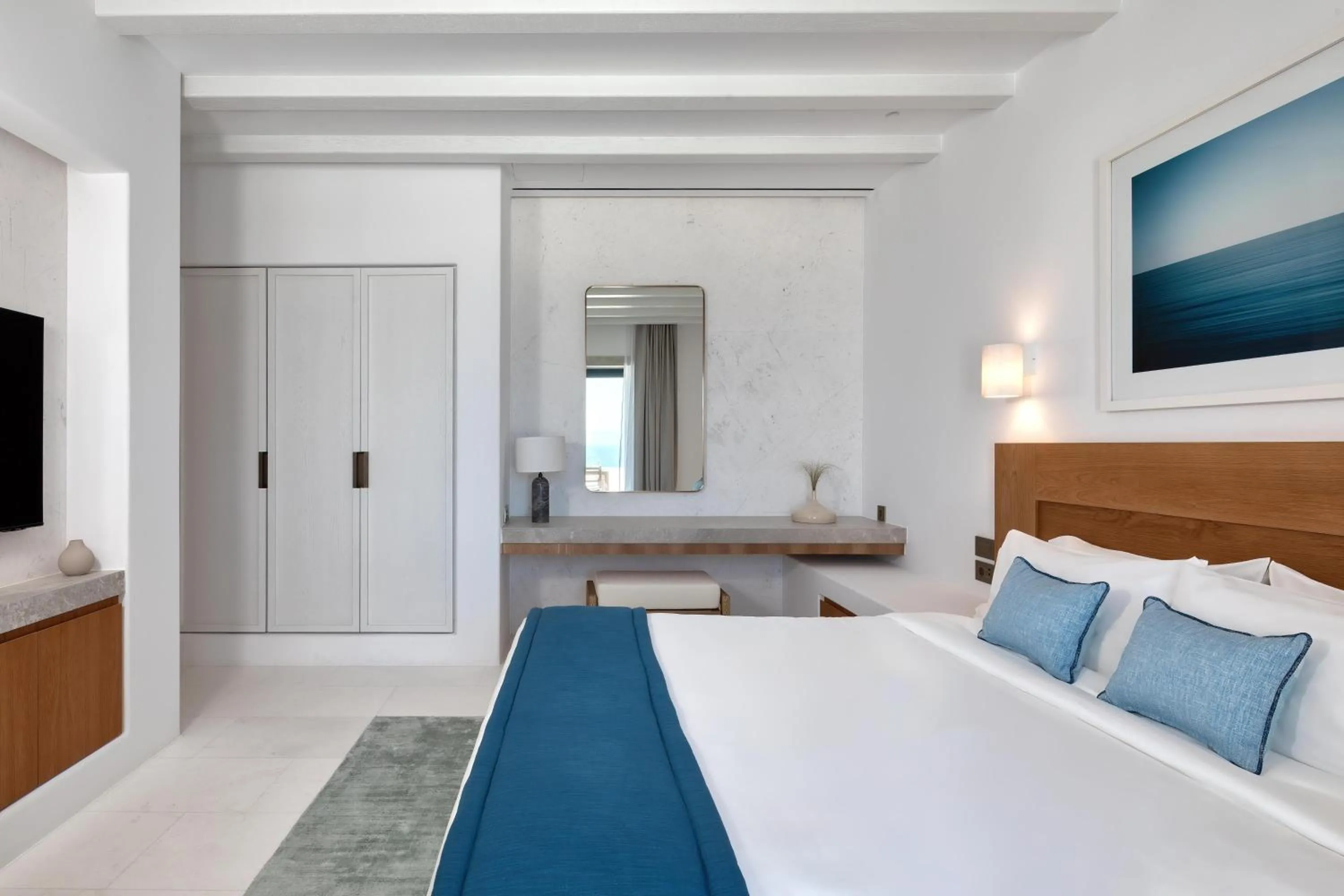 Bed in Sandblu Santorini, LXR Hotels & Resorts