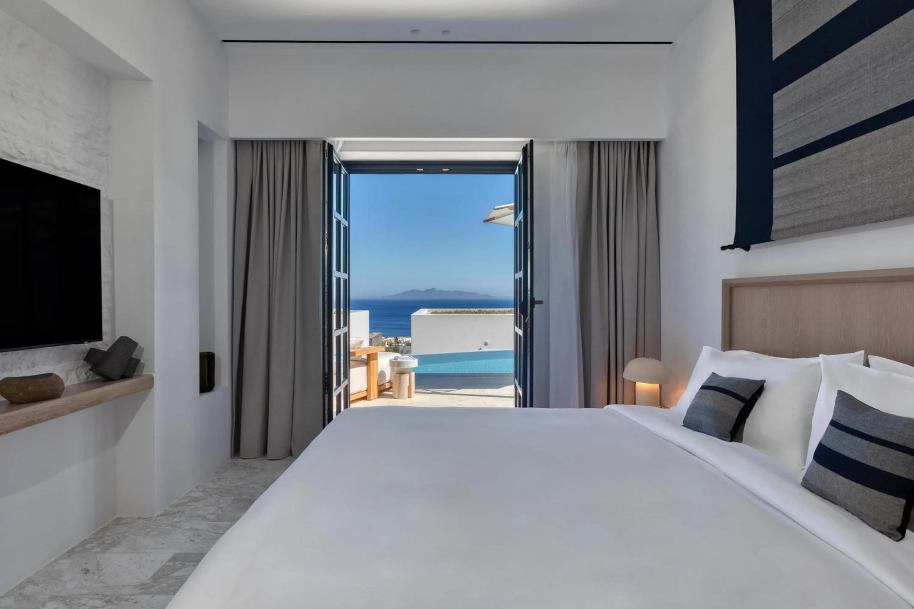 View (from property/room), Bed in Sandblu Santorini, LXR Hotels & Resorts