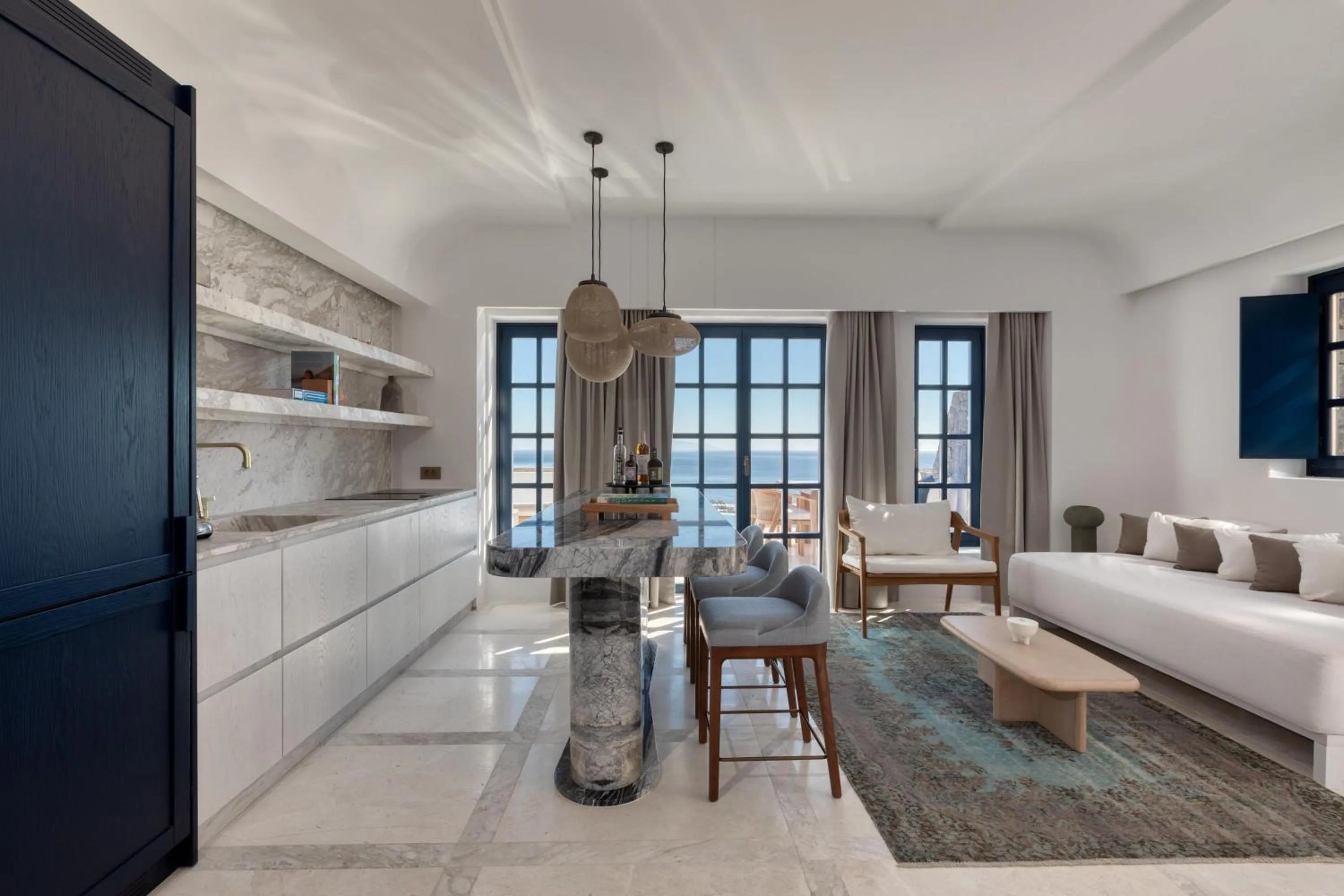 Living room, Bed in Sandblu Santorini, LXR Hotels & Resorts