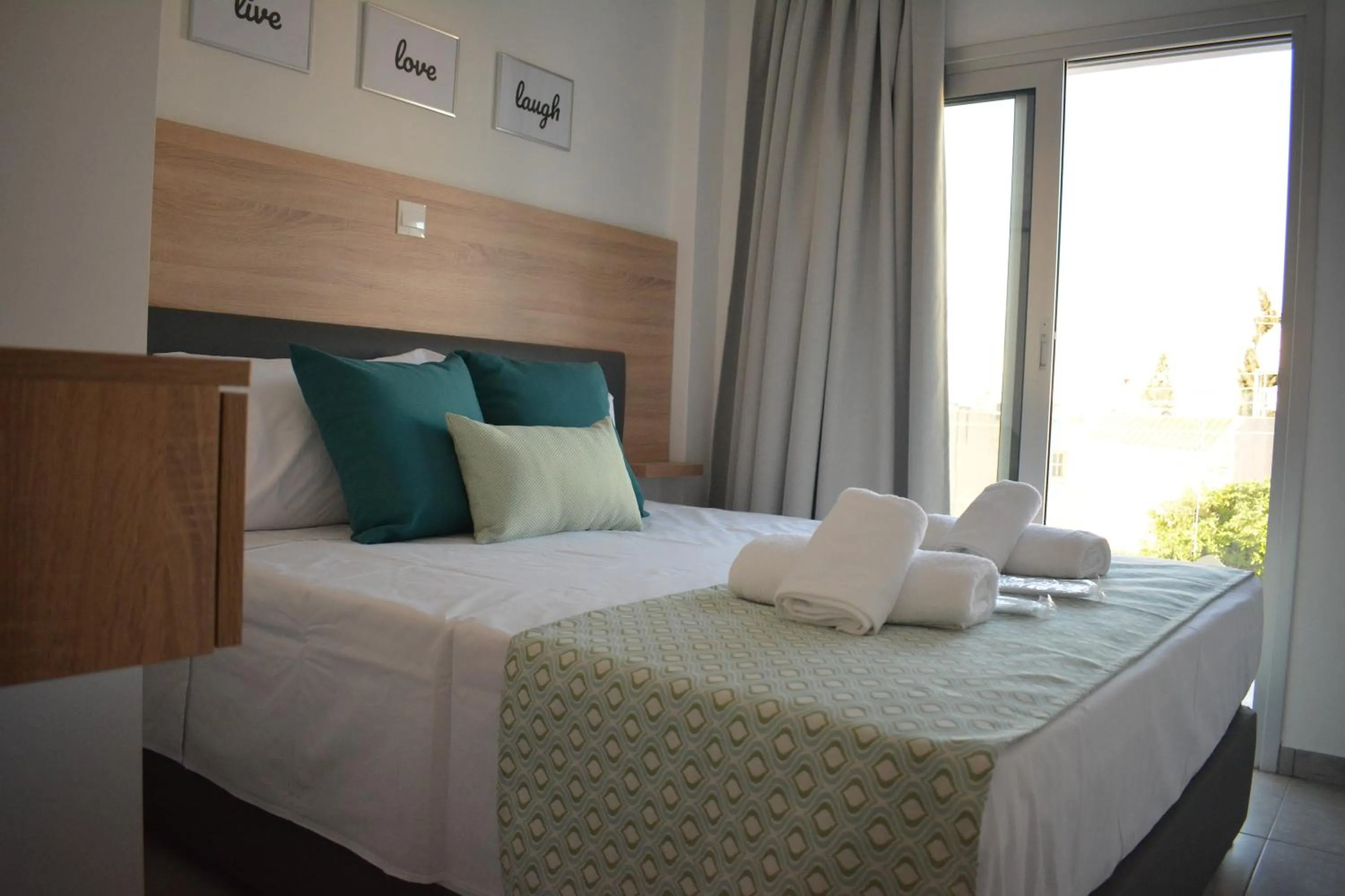 Bed in Green Bay Suites