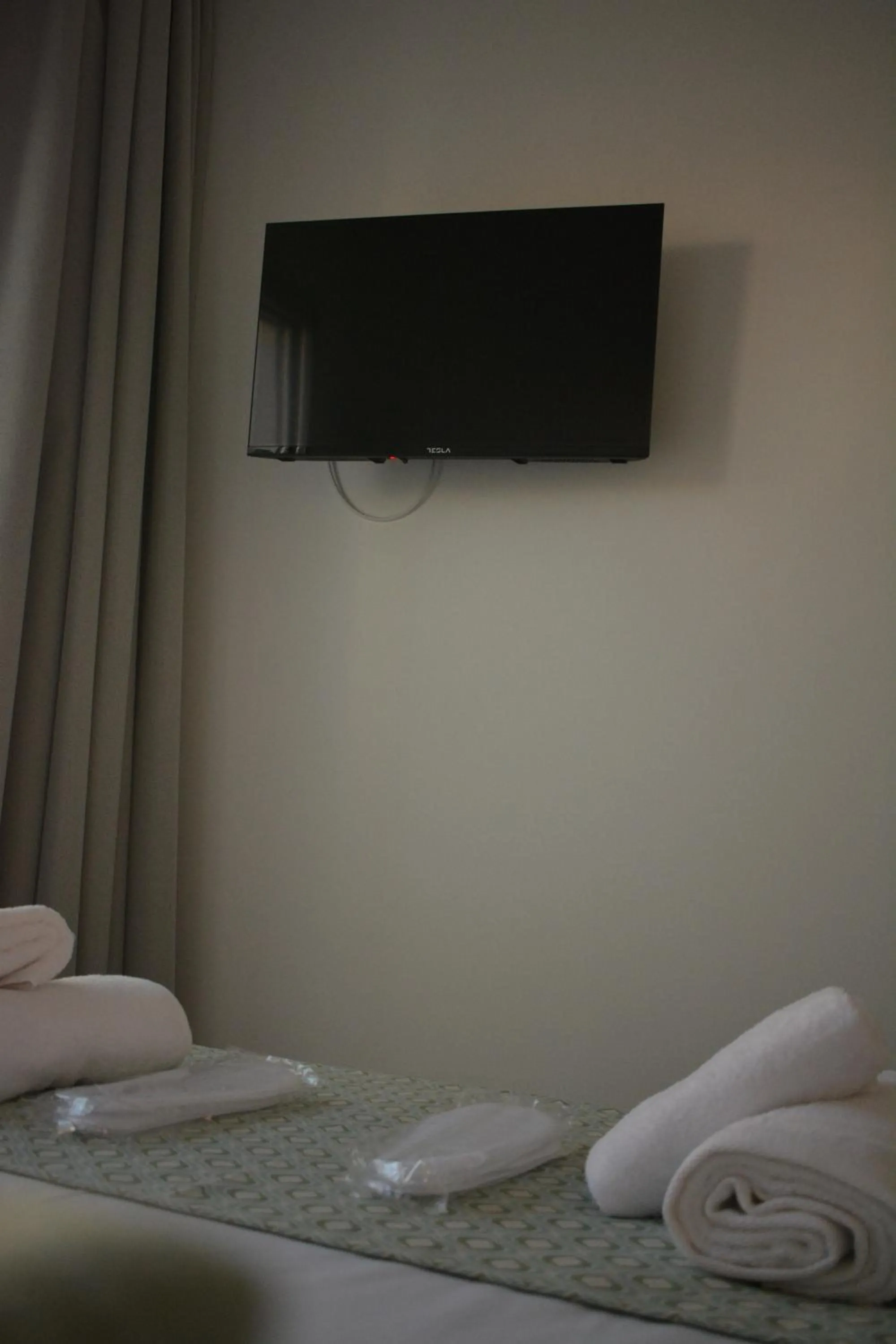 Bed in Green Bay Suites