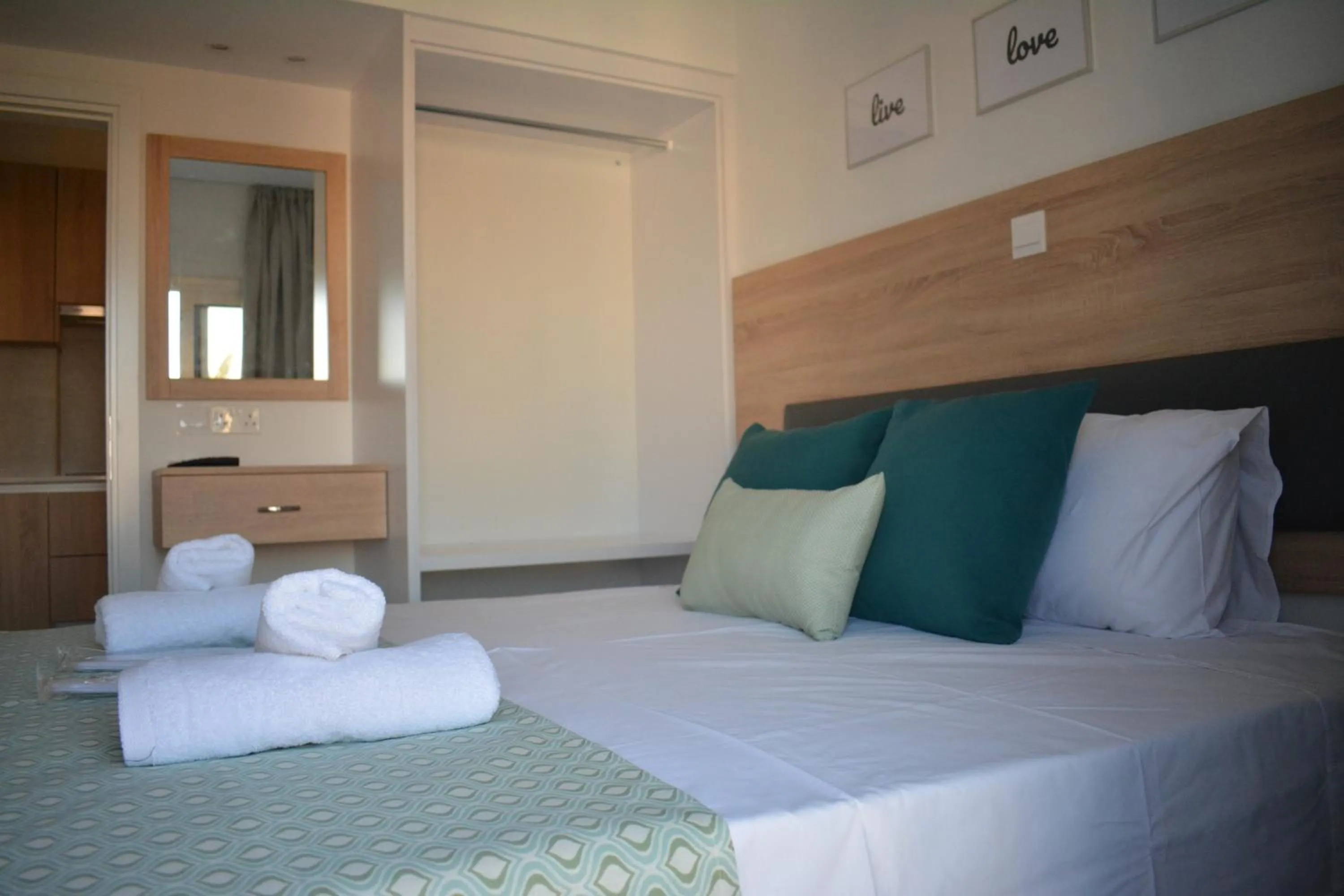 Bed in Green Bay Suites