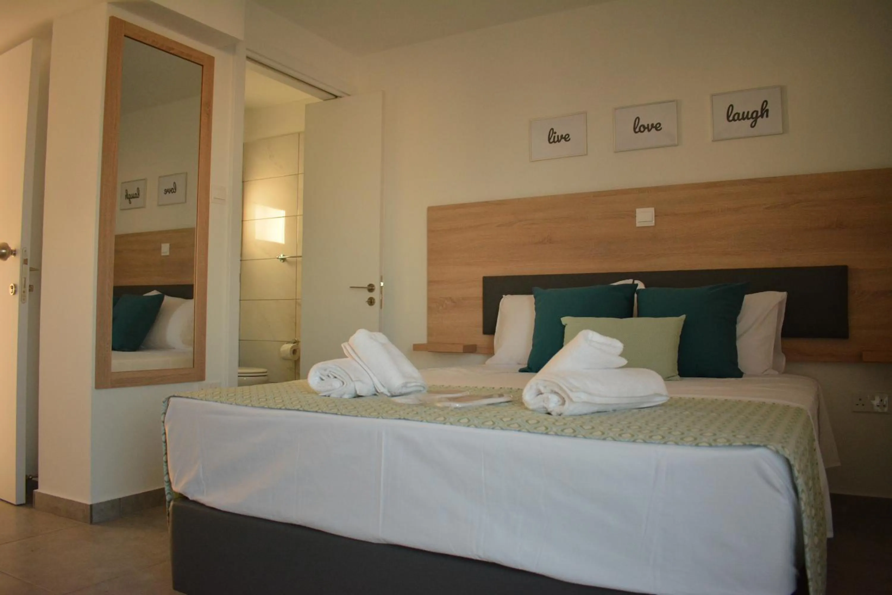 Bed in Green Bay Suites