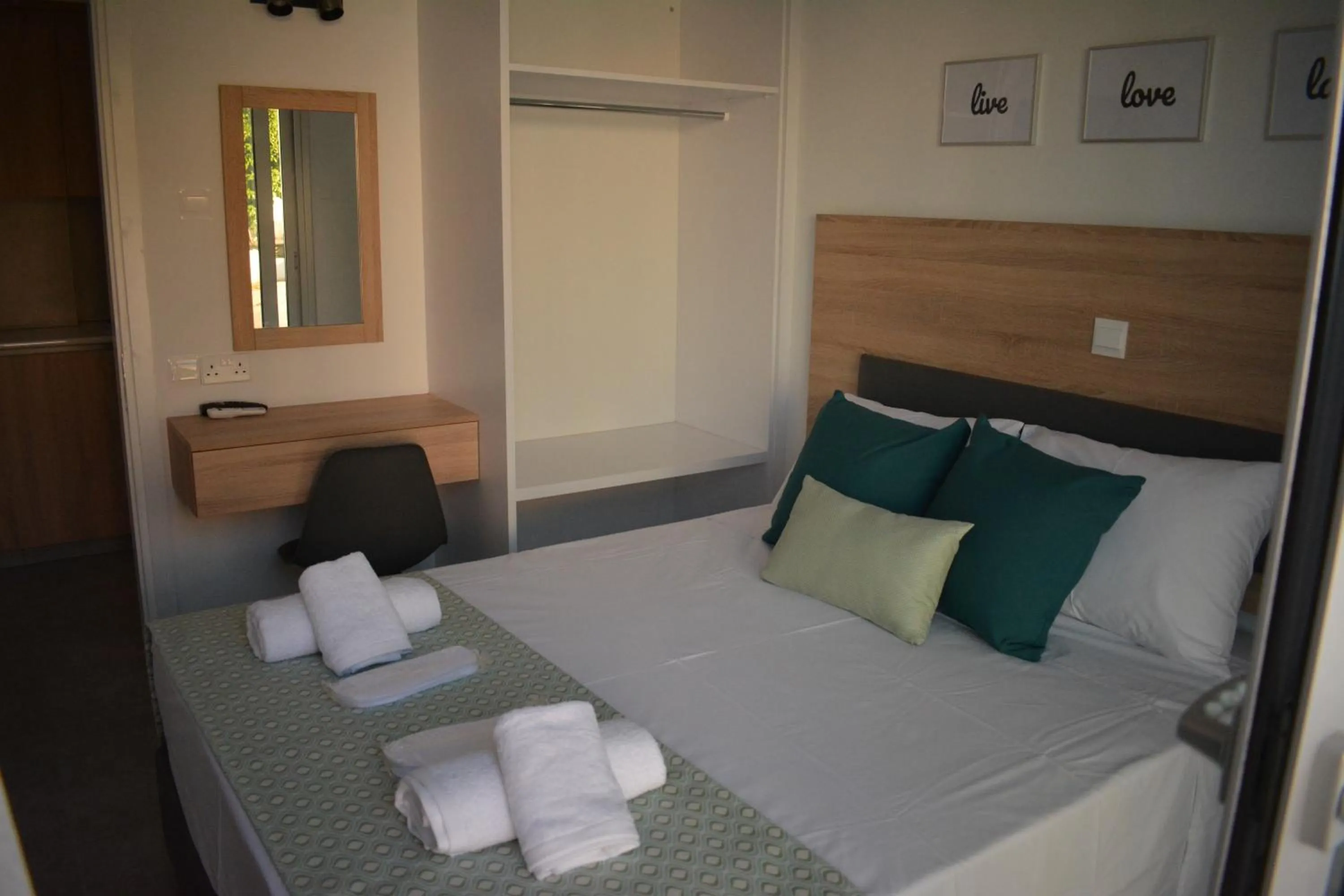 Bed in Green Bay Suites