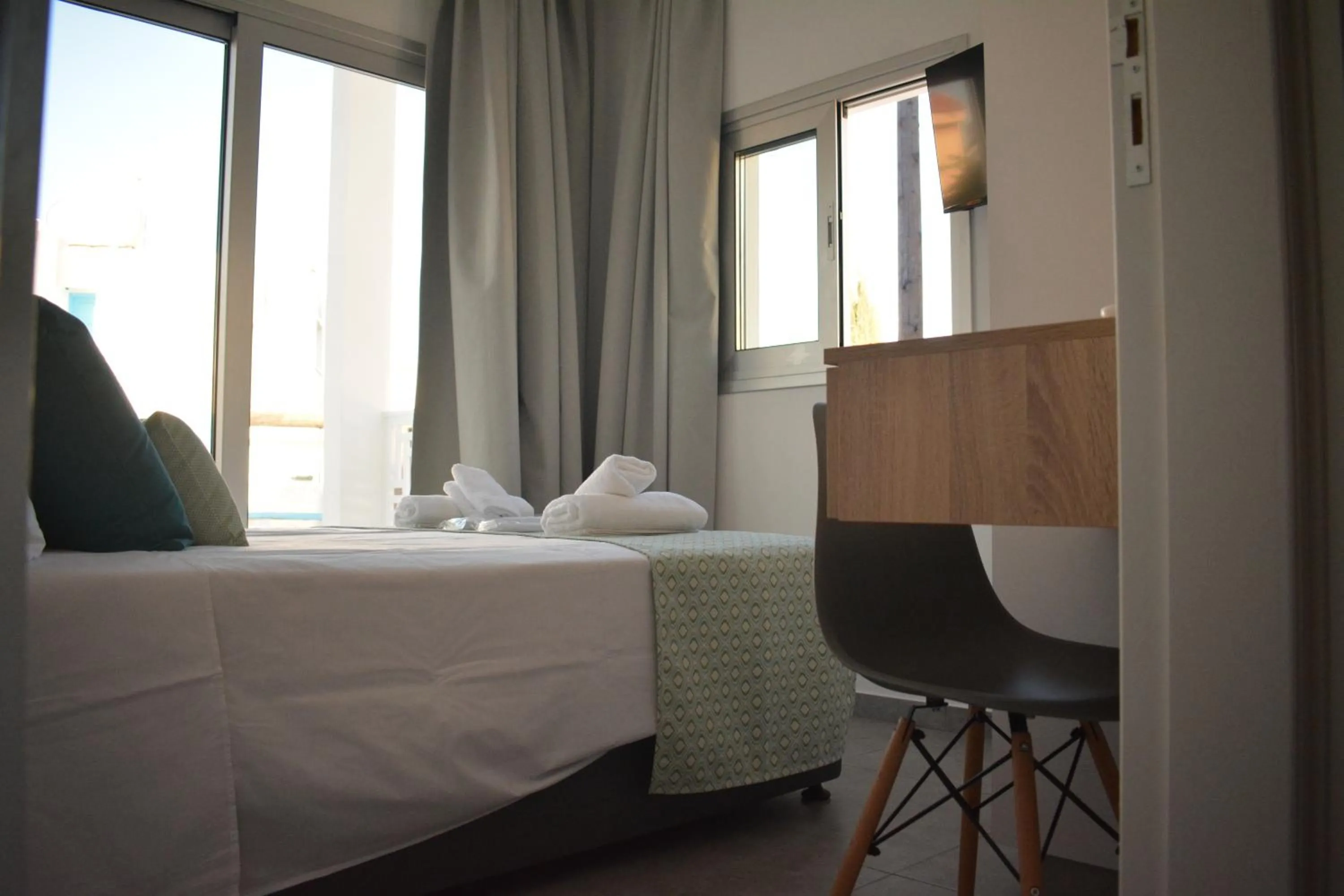 Bed in Green Bay Suites
