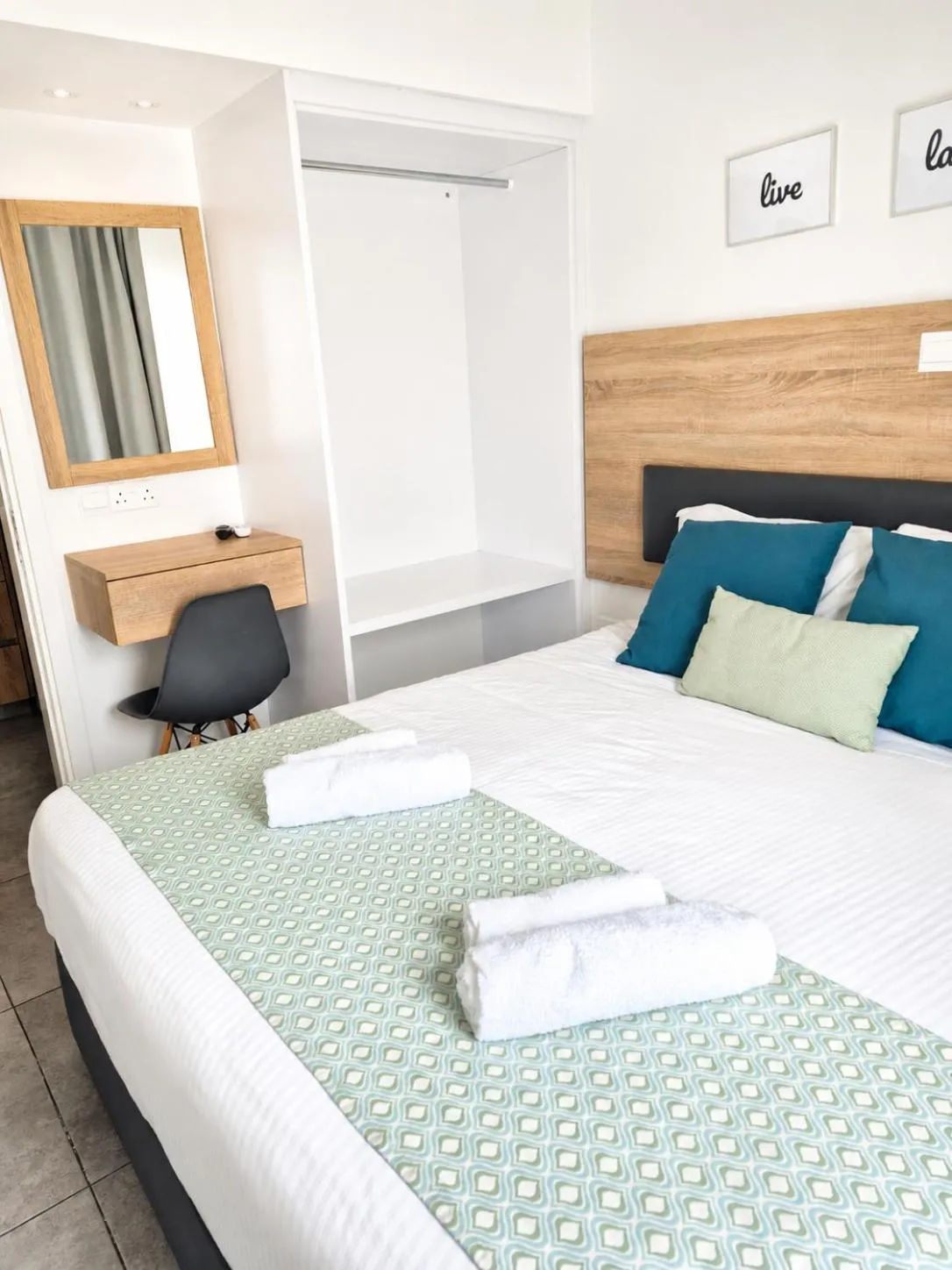 Bed in Green Bay Suites