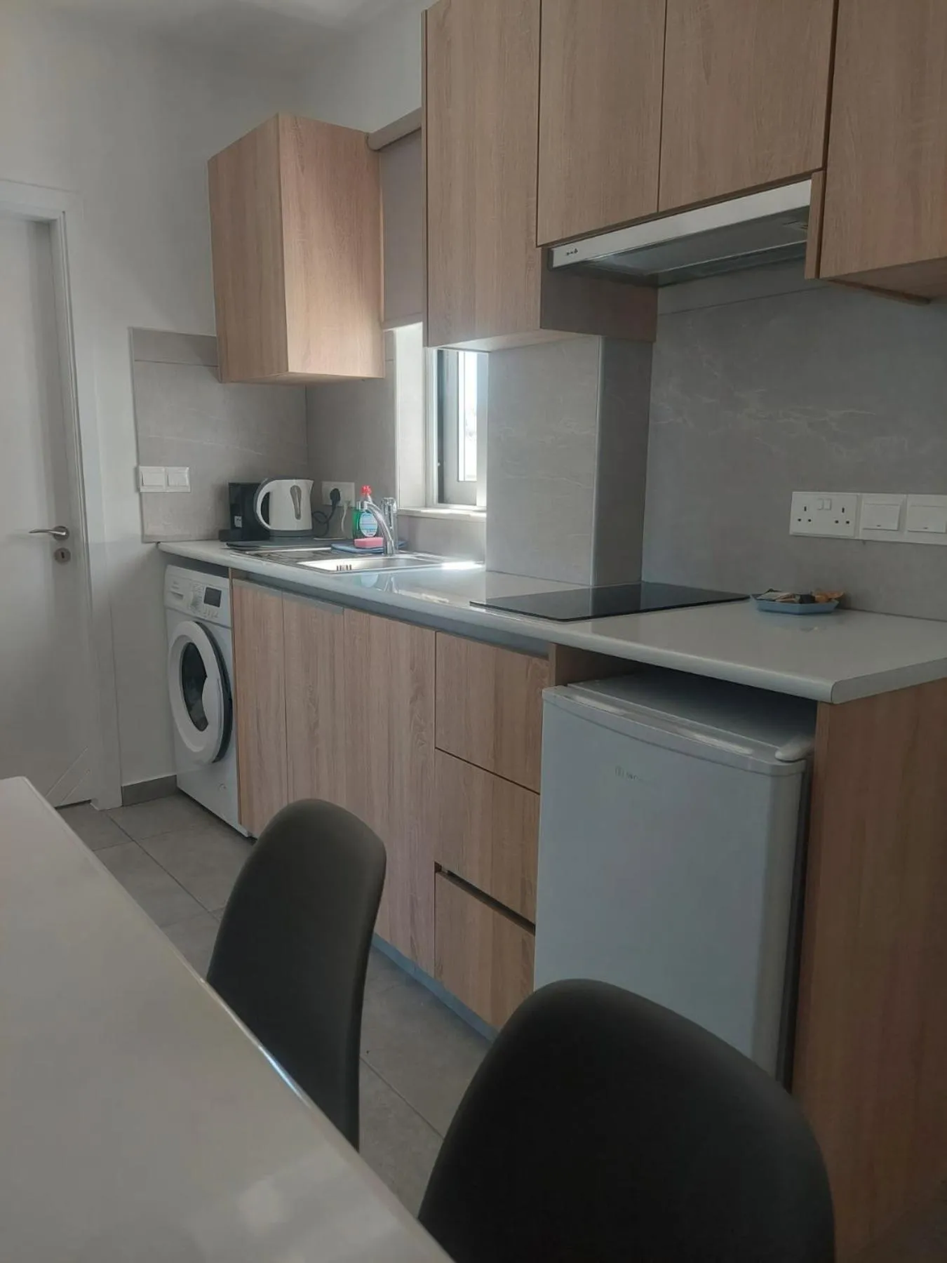 Kitchen or kitchenette in Green Bay Suites