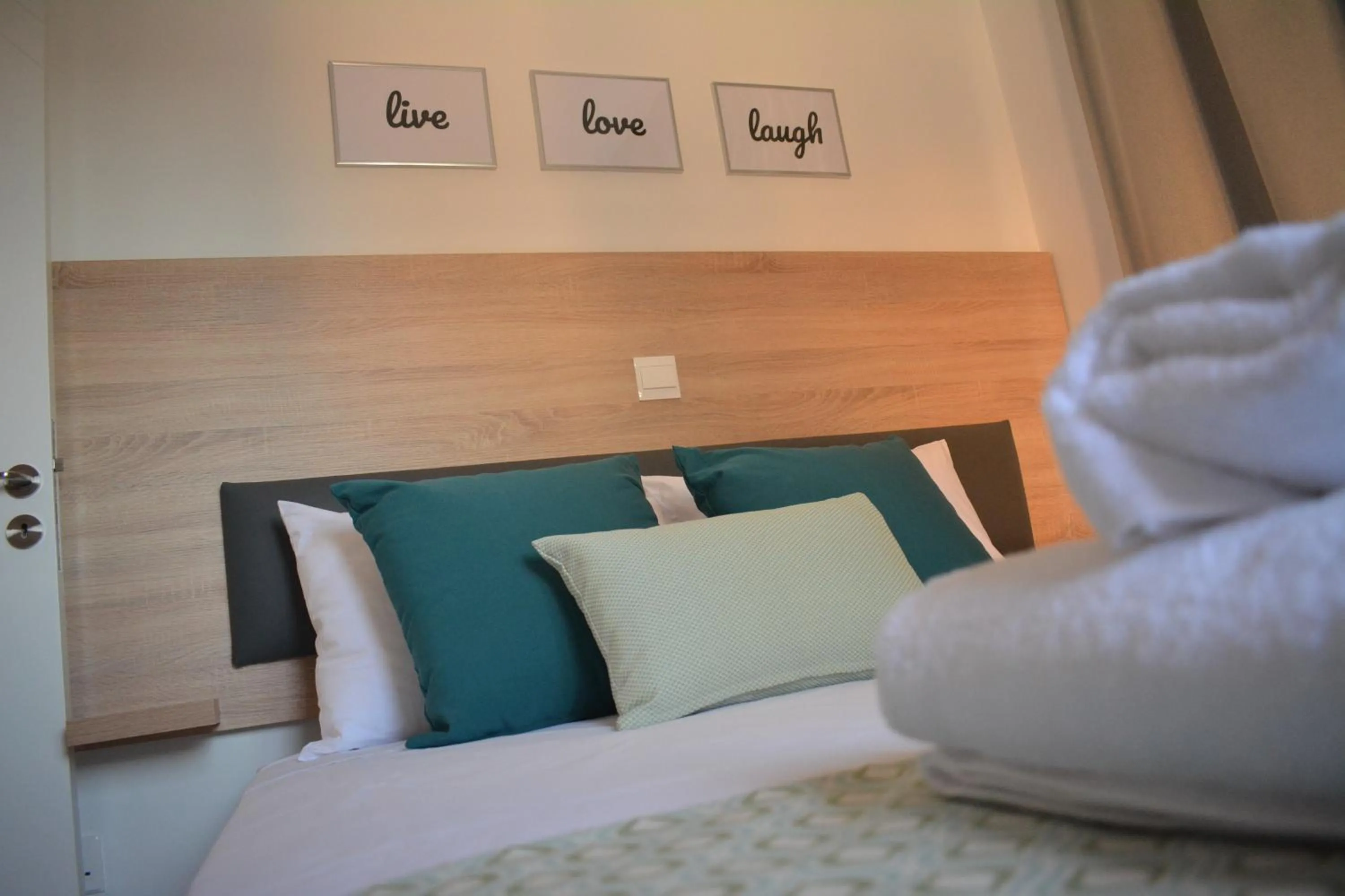 Bed in Green Bay Suites