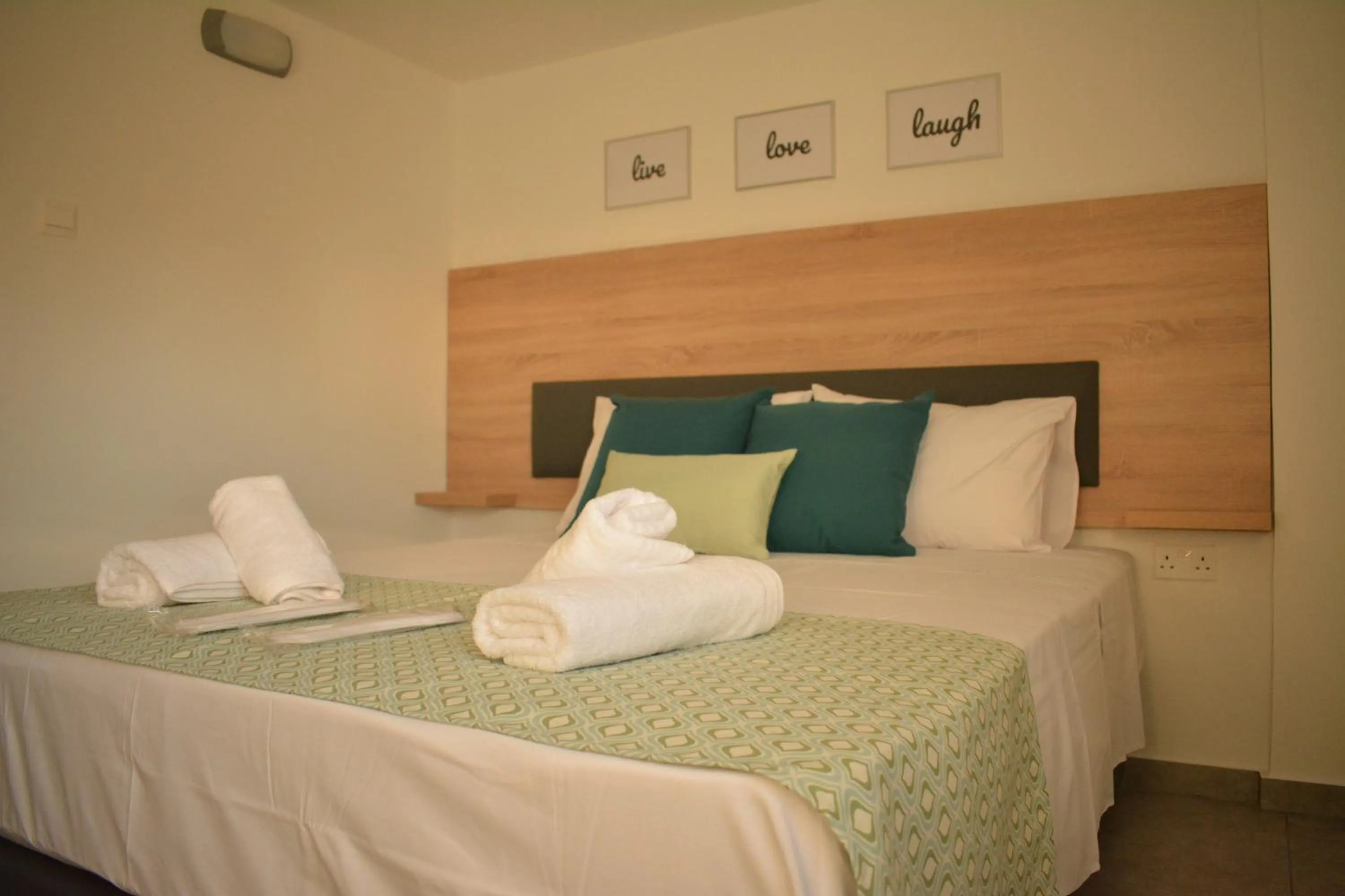 Bed in Green Bay Suites