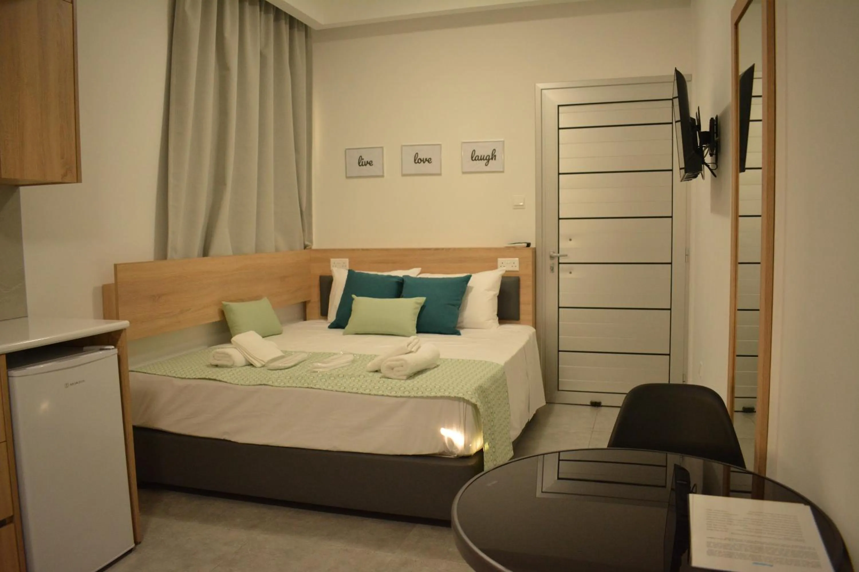 Bed in Green Bay Suites