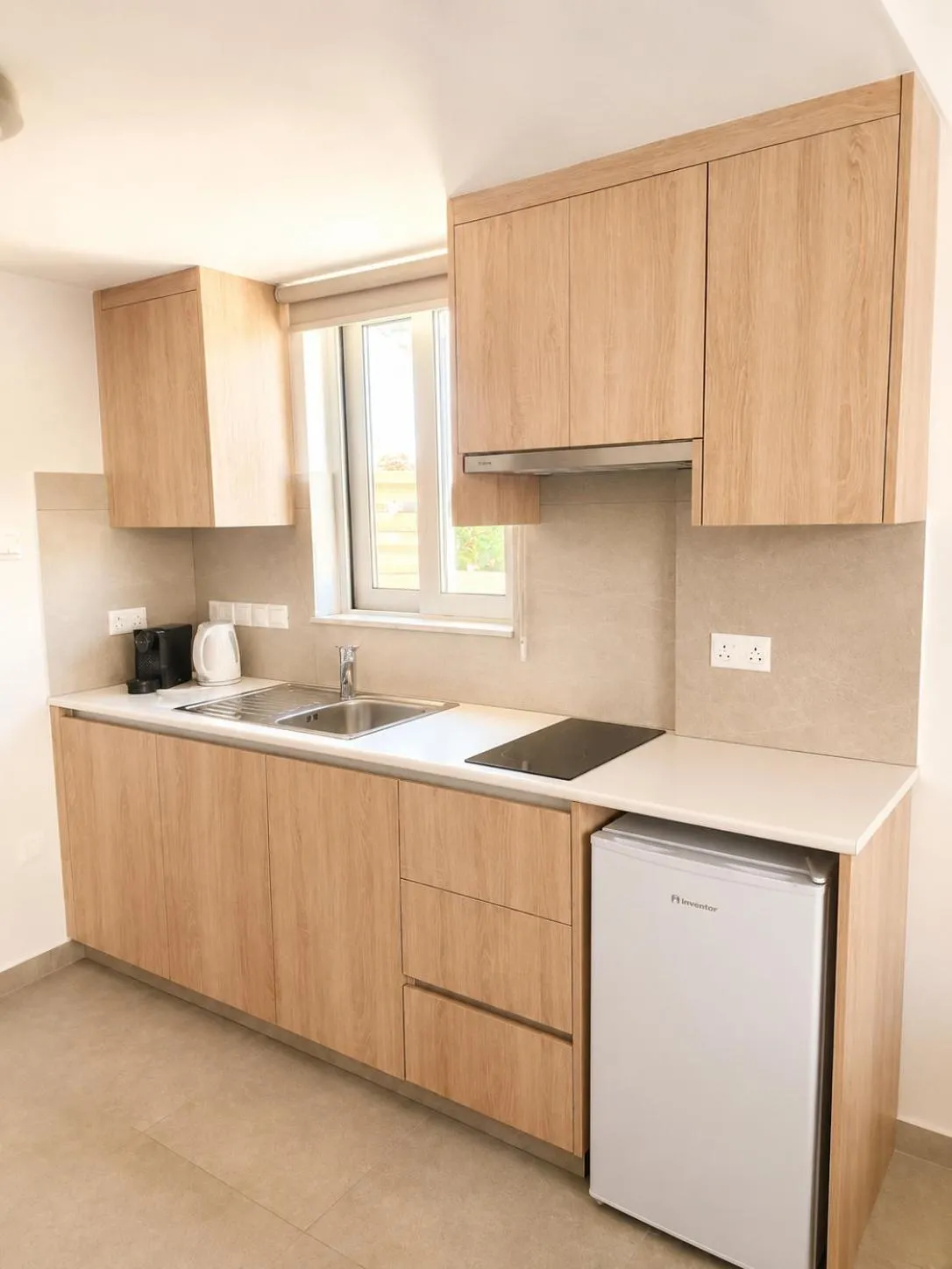 Kitchen or kitchenette in Green Bay Suites