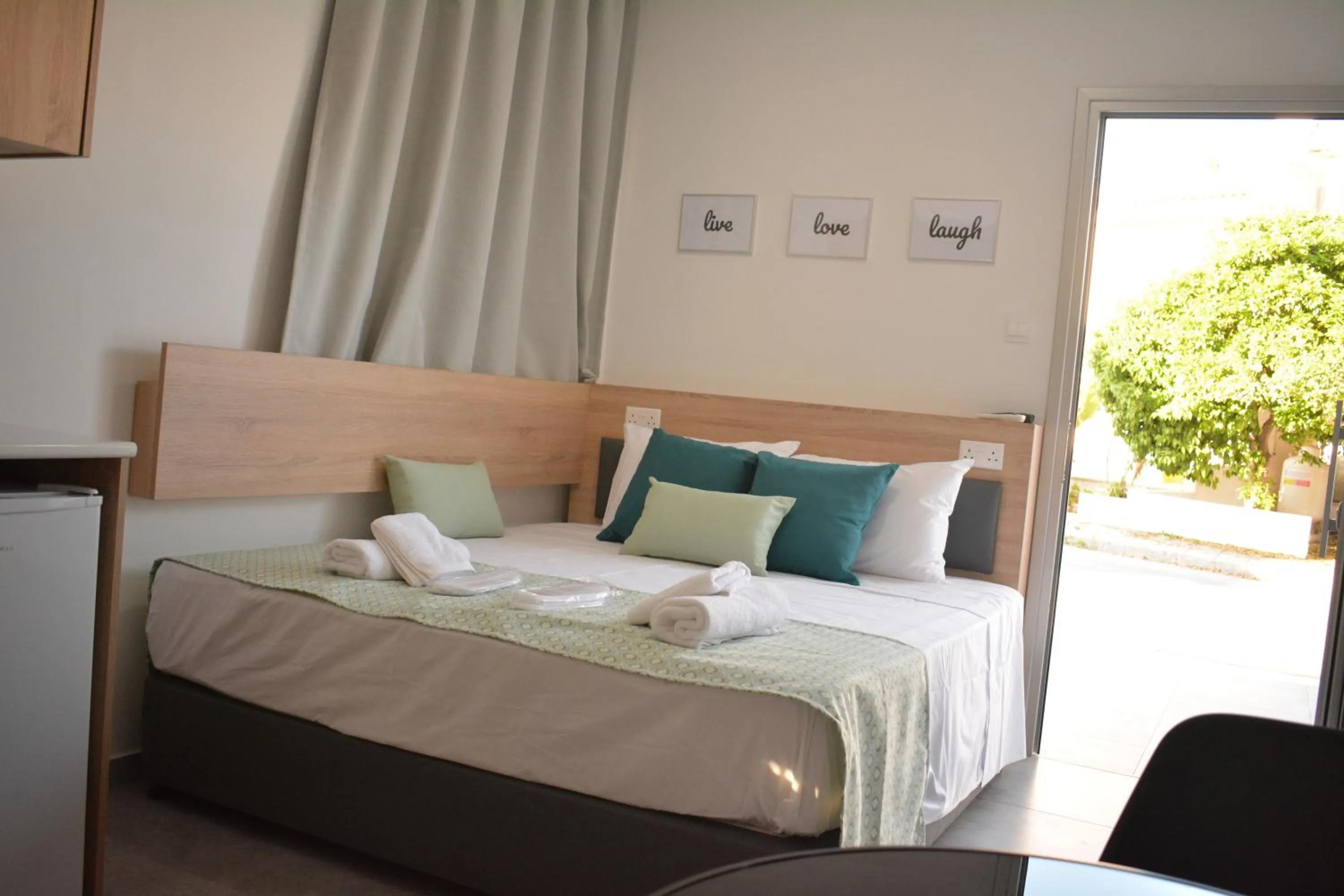 Bed in Green Bay Suites