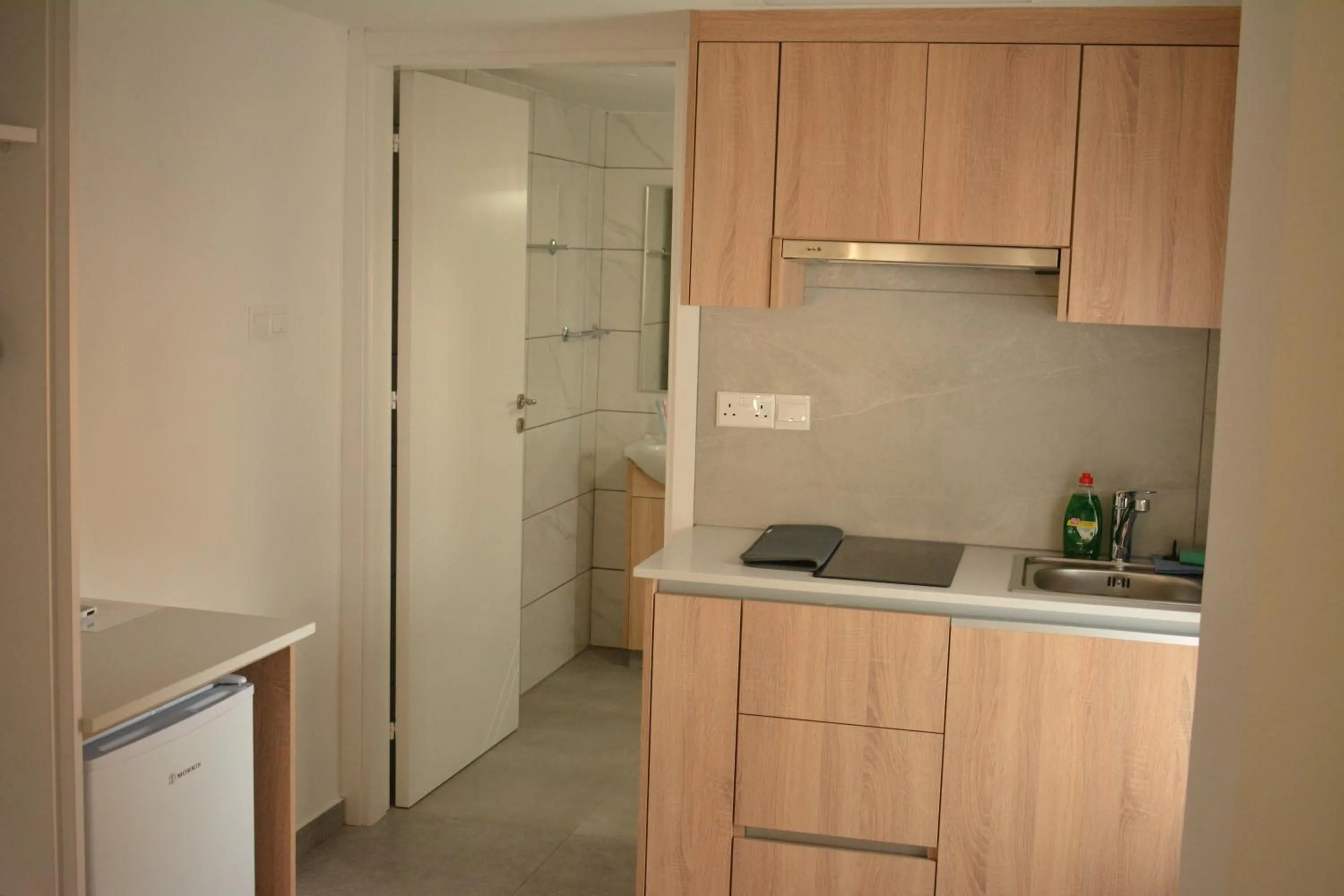 Kitchen or kitchenette in Green Bay Suites