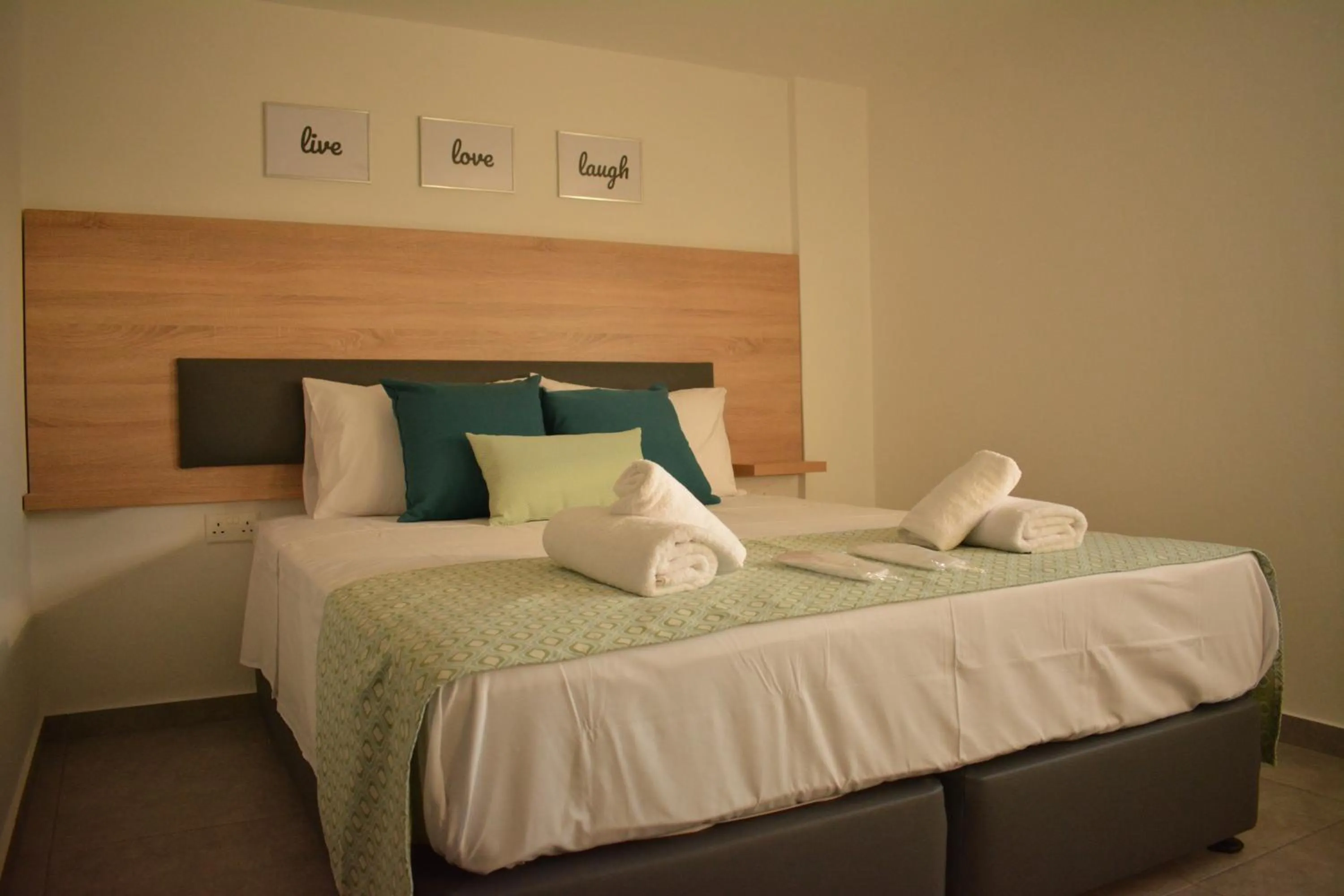 Bed in Green Bay Suites