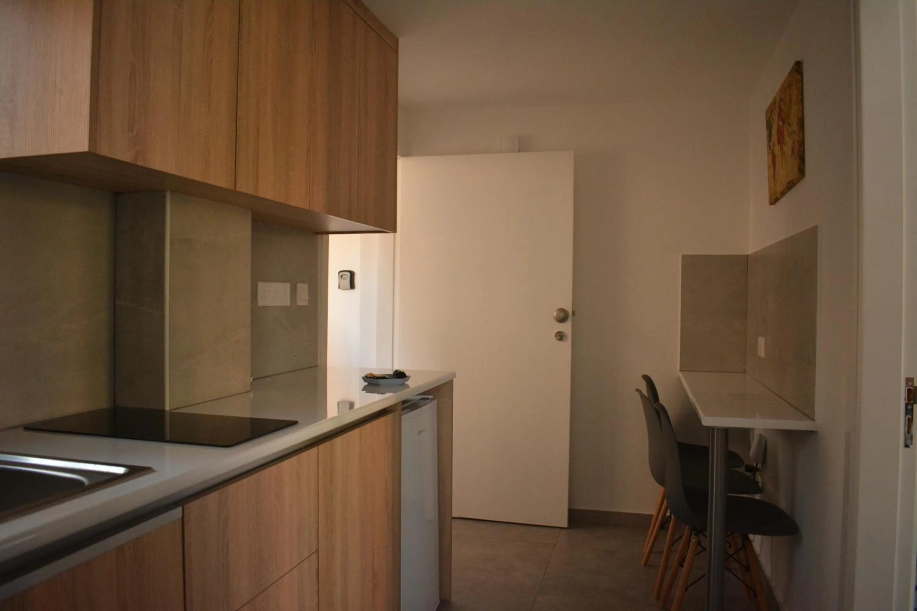Kitchen or kitchenette in Green Bay Suites