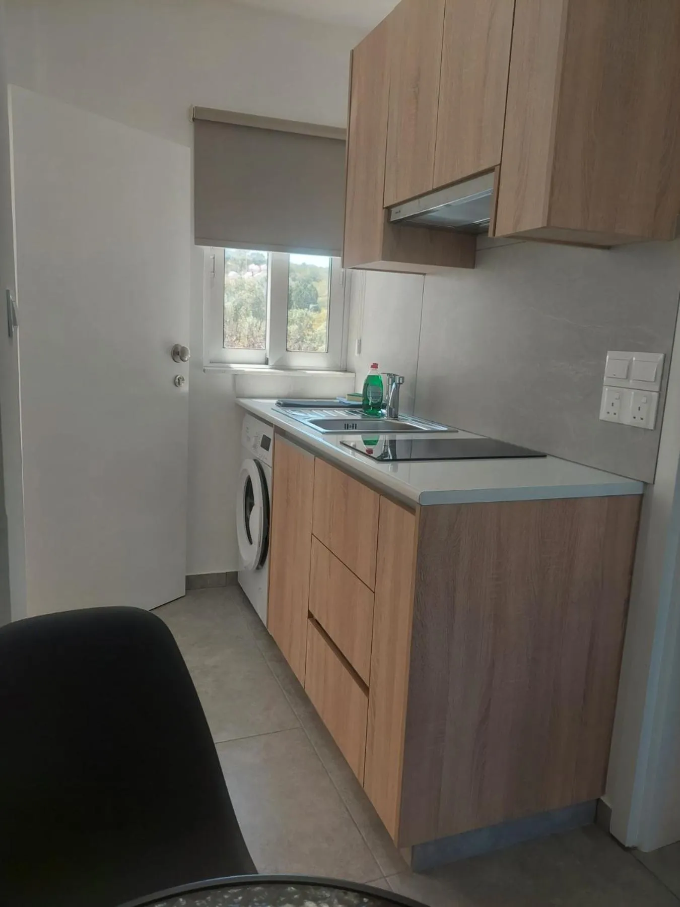 Kitchen or kitchenette in Green Bay Suites