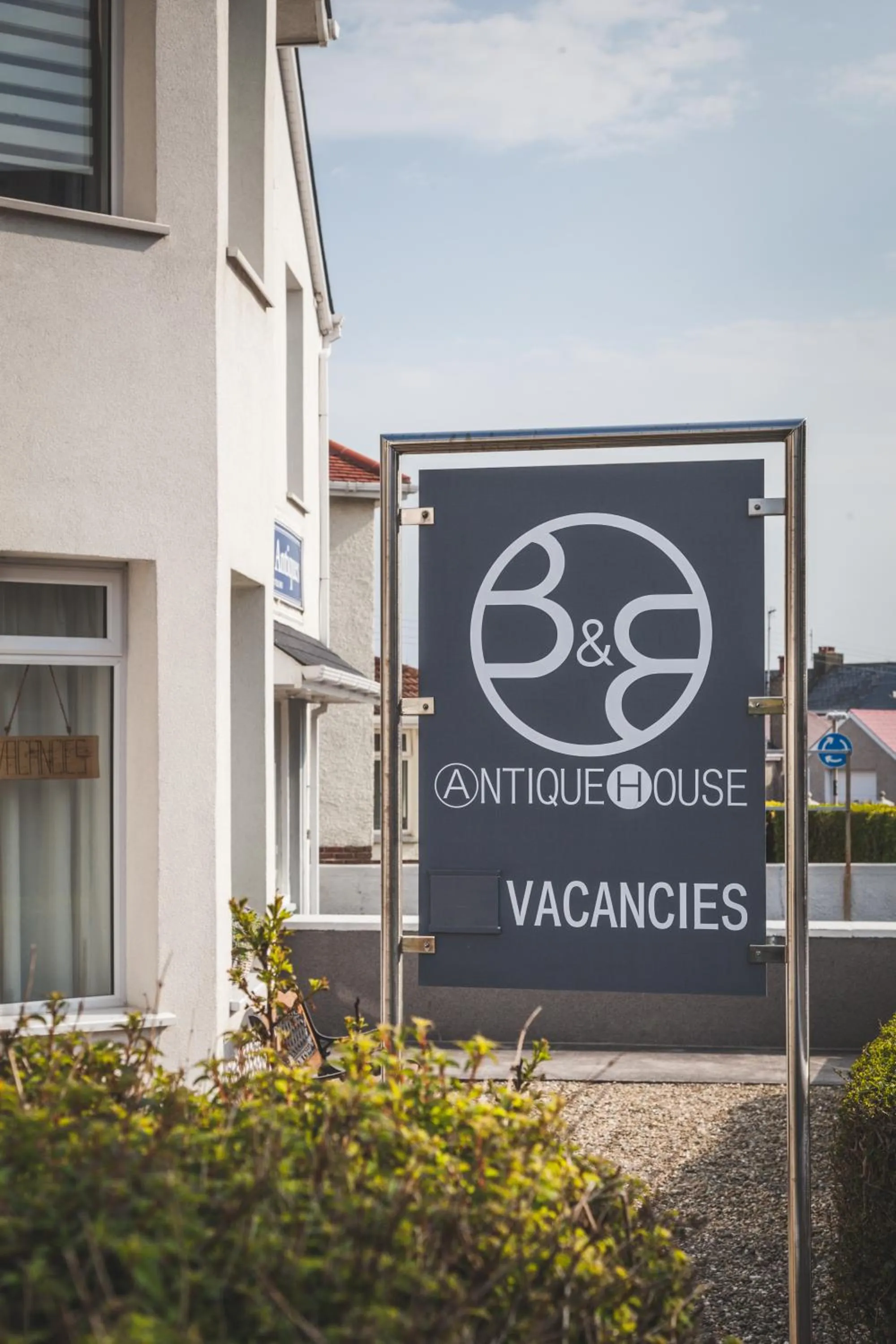 Property logo or sign in Antique House B&B