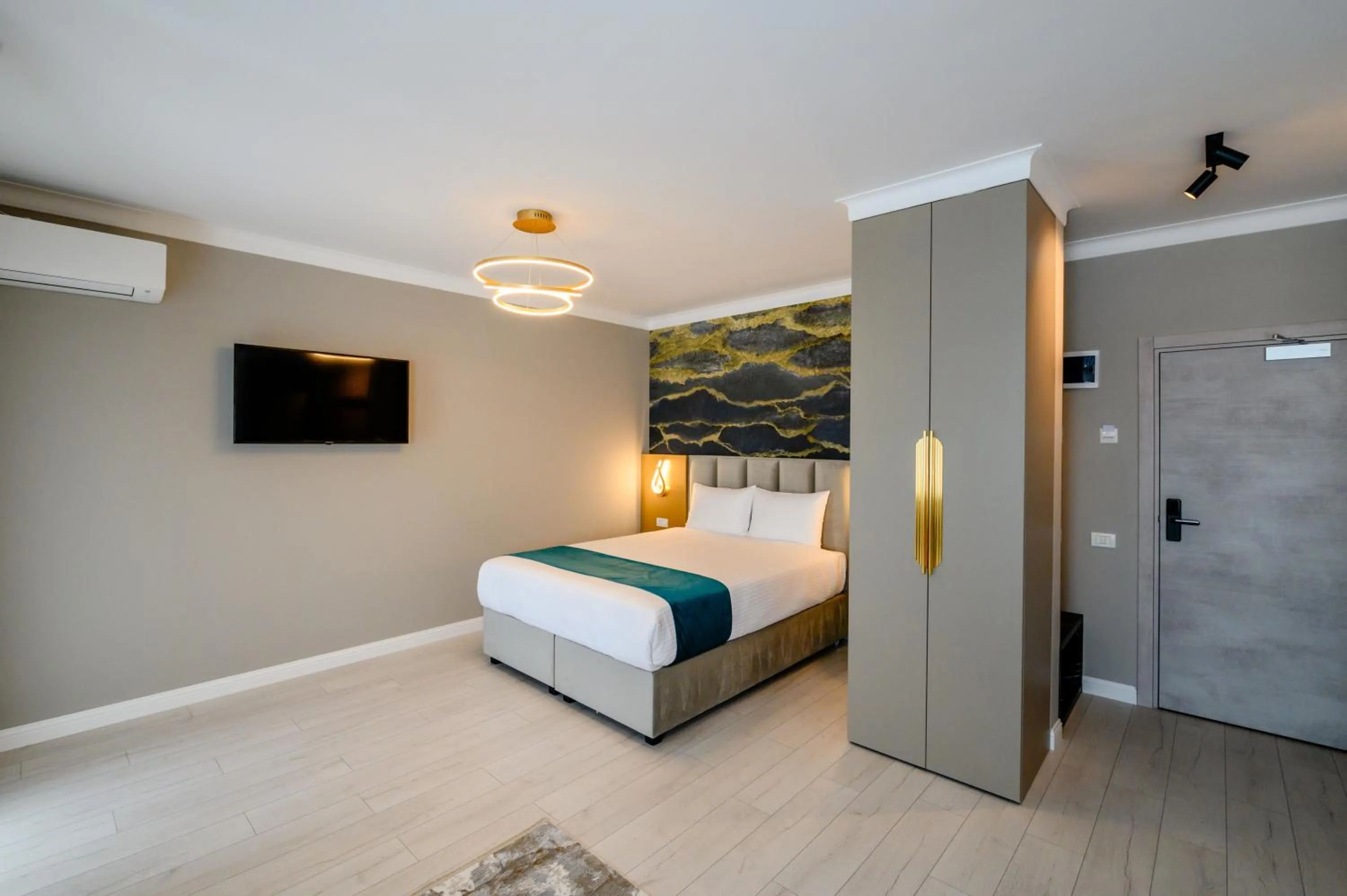 Bed in Elitte Inn & Suites