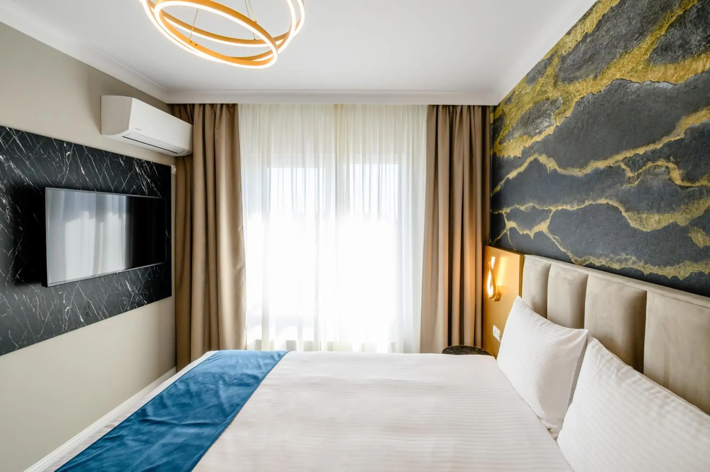 Bed in Elitte Inn & Suites Bed in Elitte Inn & Suites