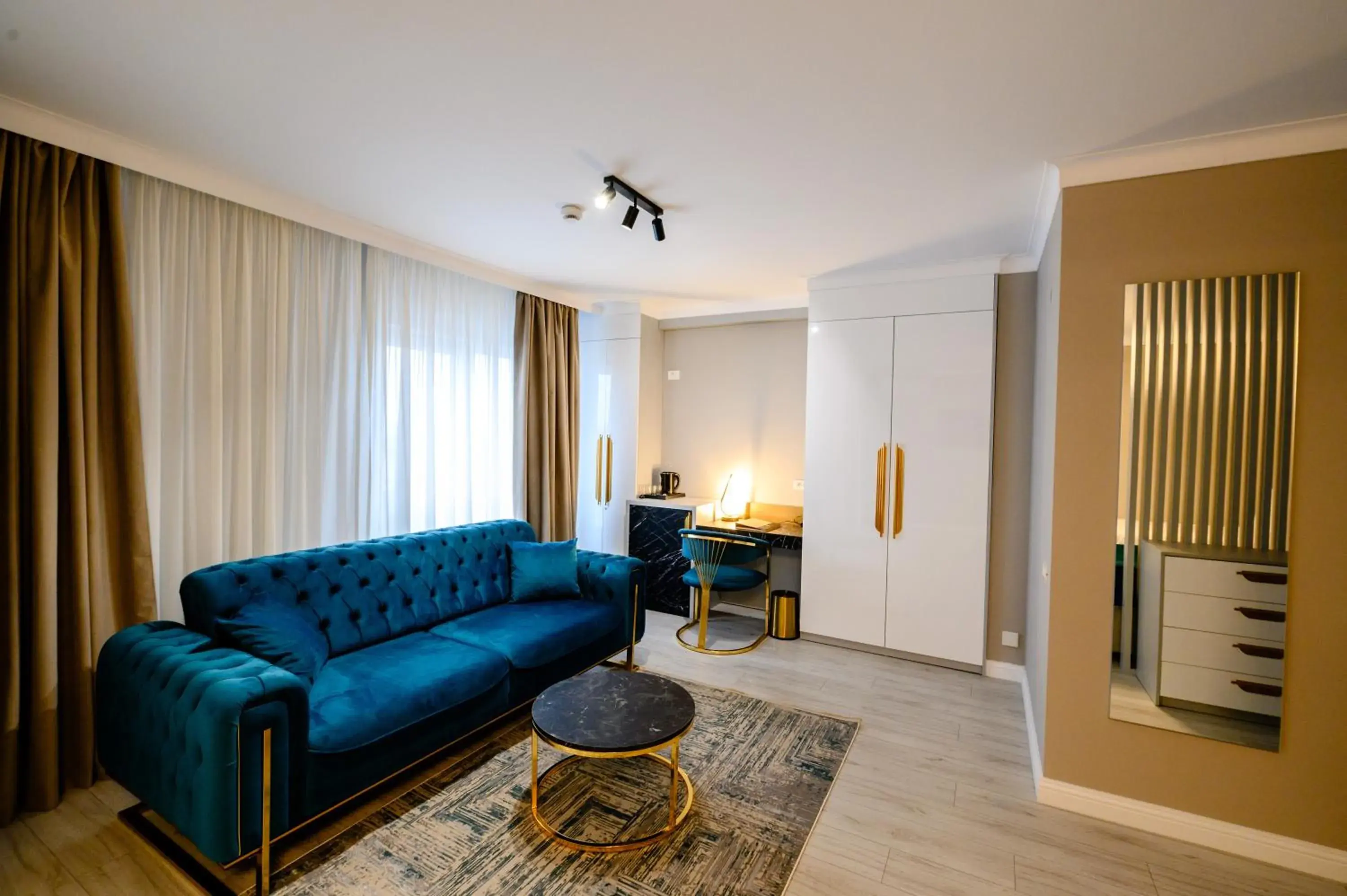 Living room in Elitte Inn & Suites Living room in Elitte Inn & Suites