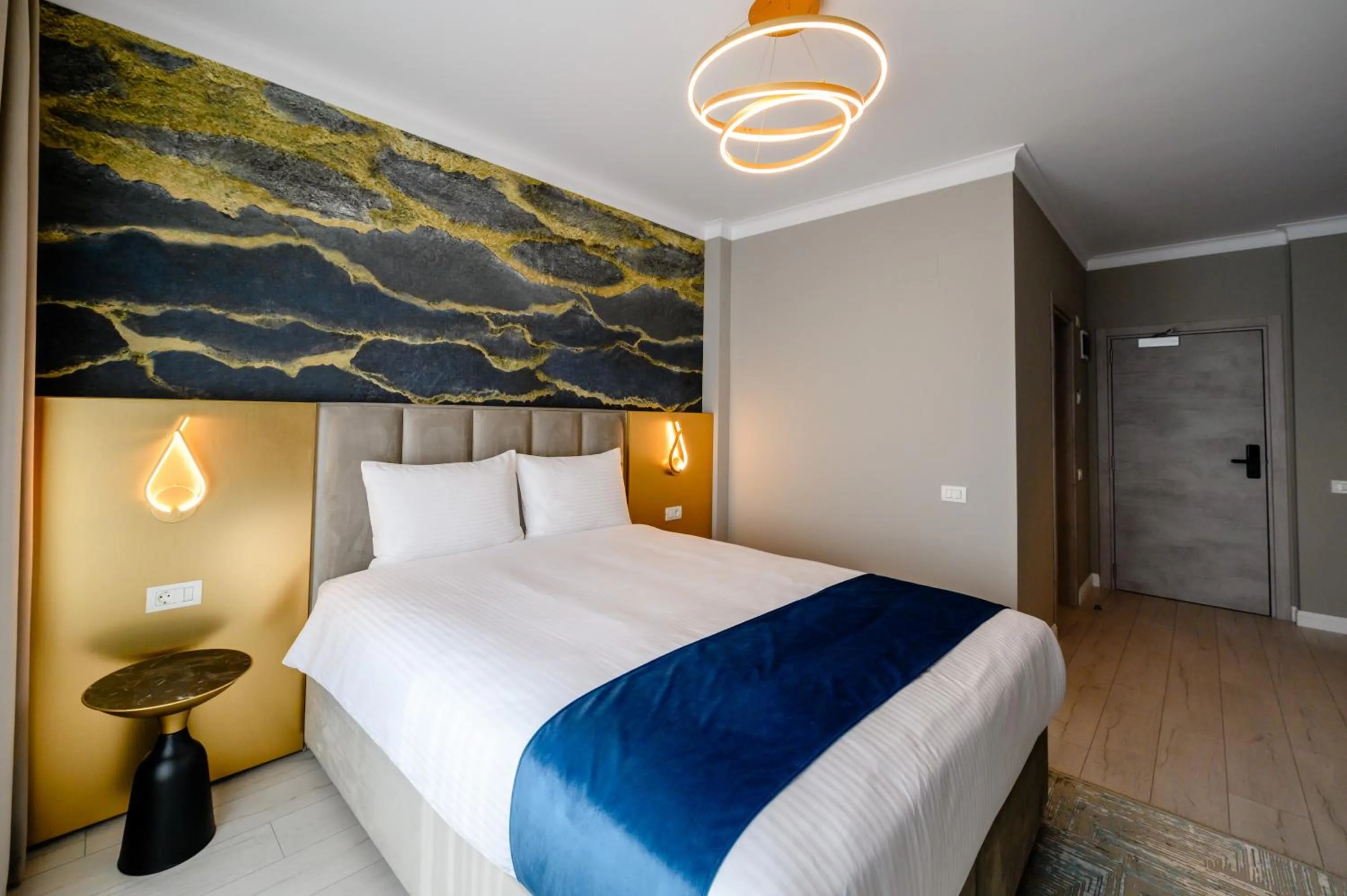 Bed in Elitte Inn & Suites