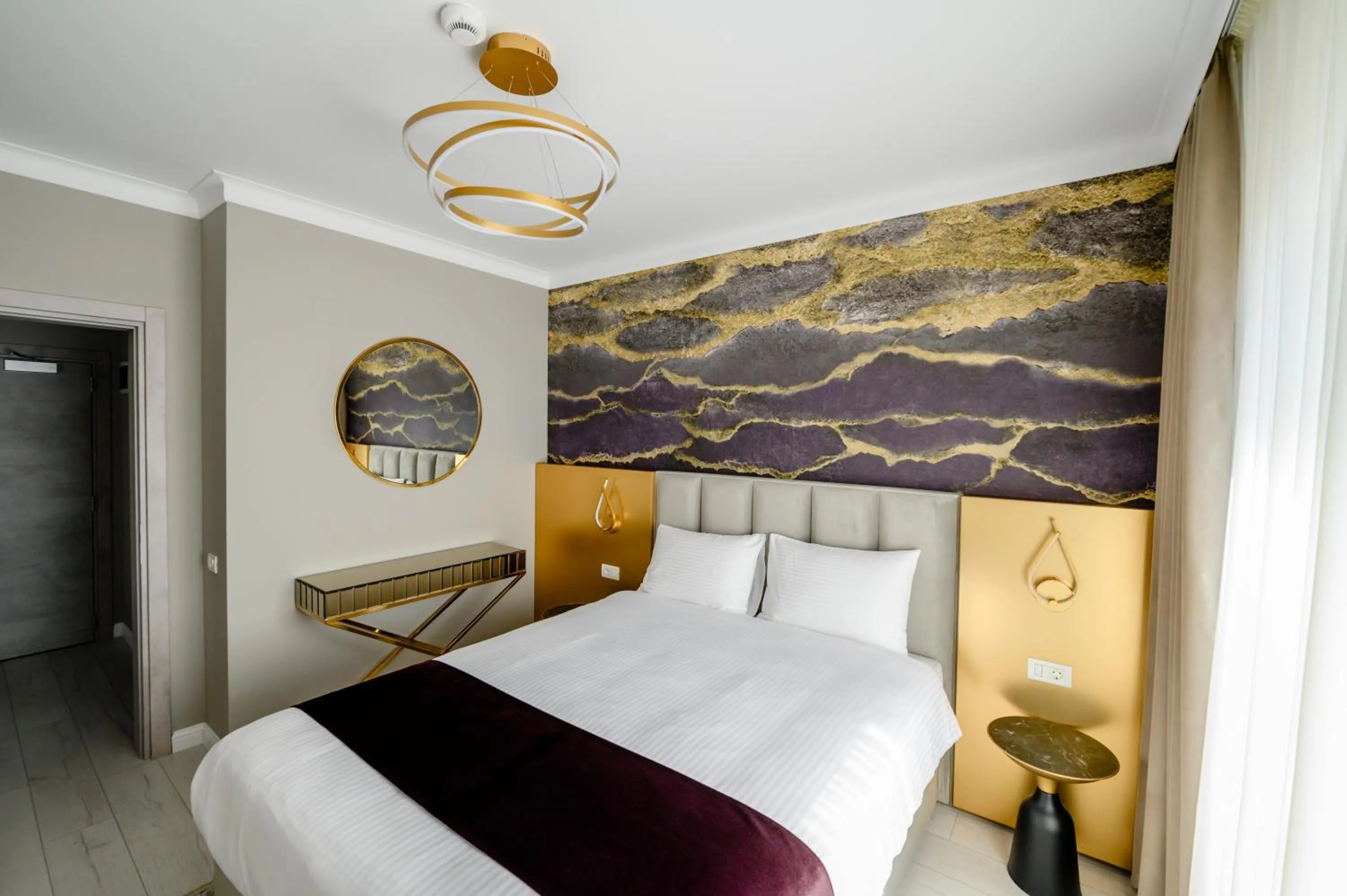 Bed in Elitte Inn & Suites