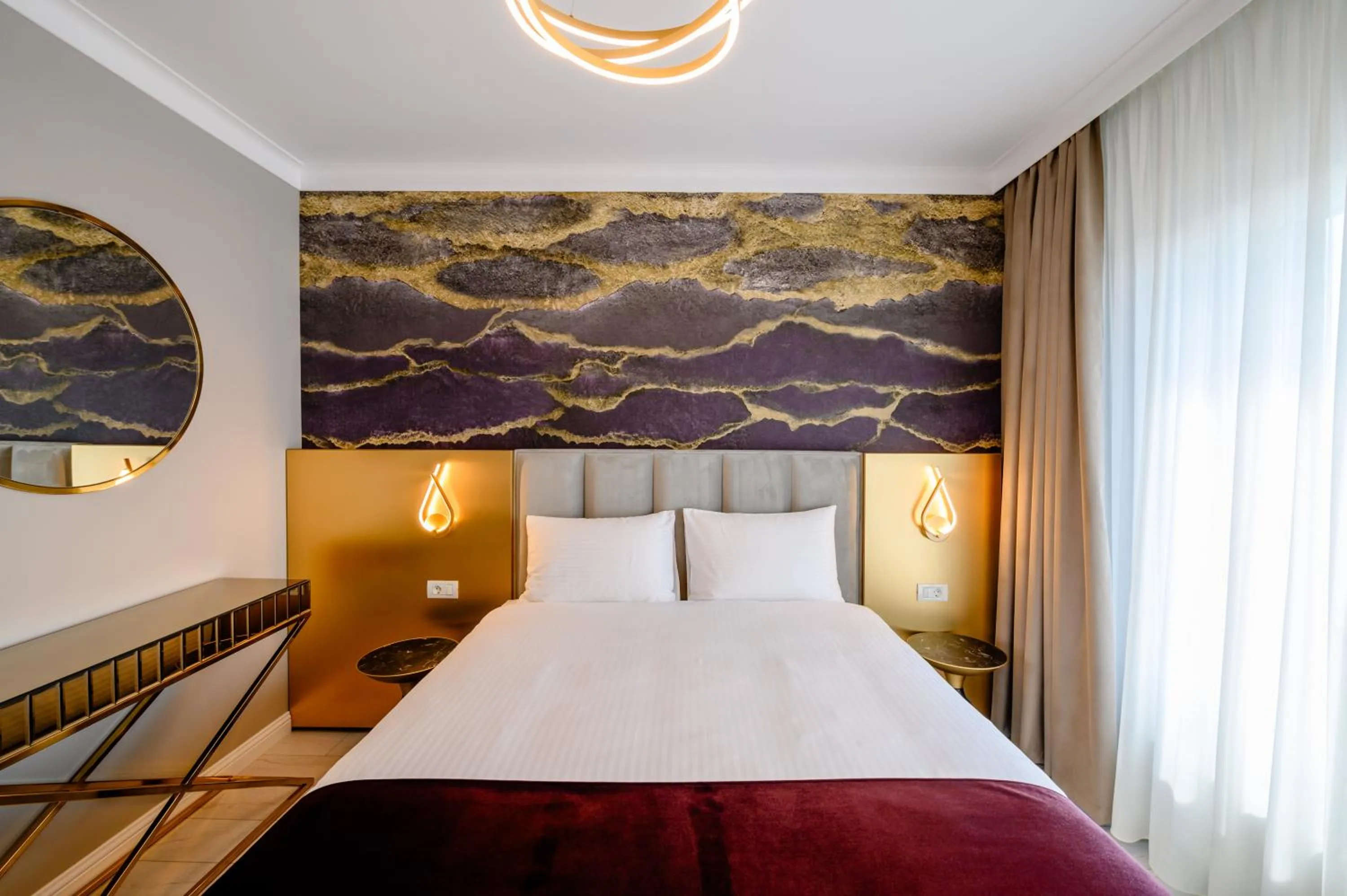 Bed in Elitte Inn & Suites