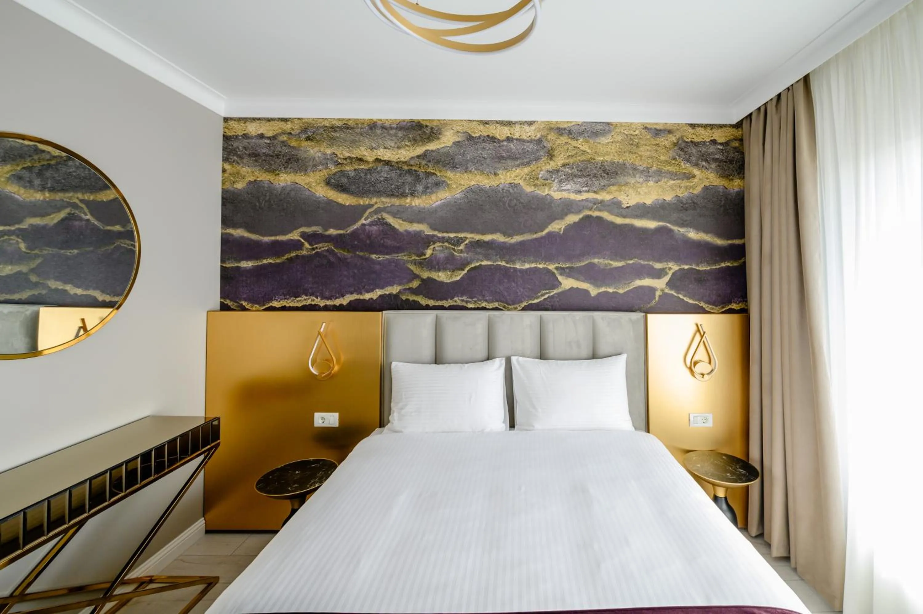 Bed in Elitte Inn & Suites