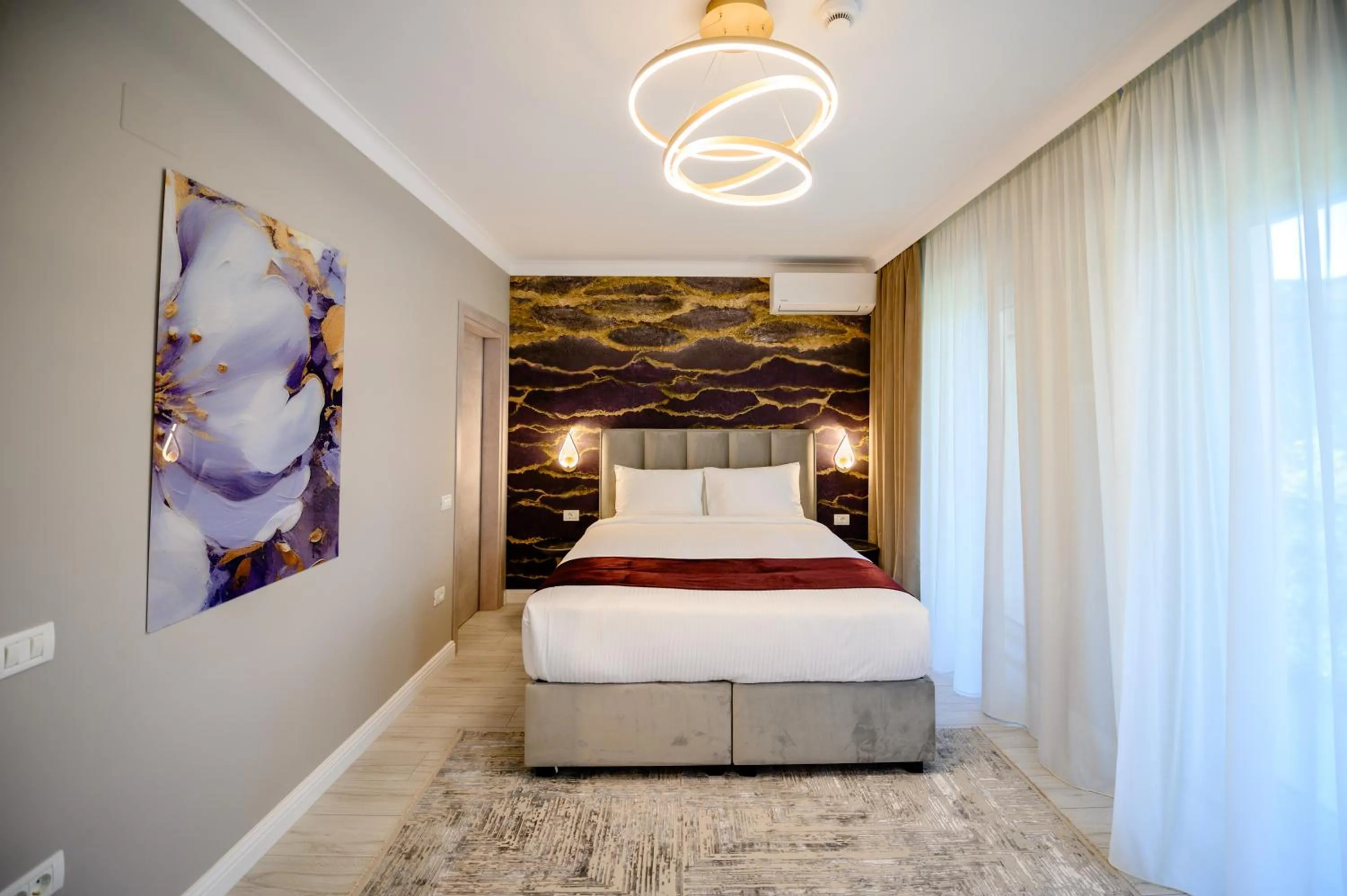 Bed in Elitte Inn & Suites