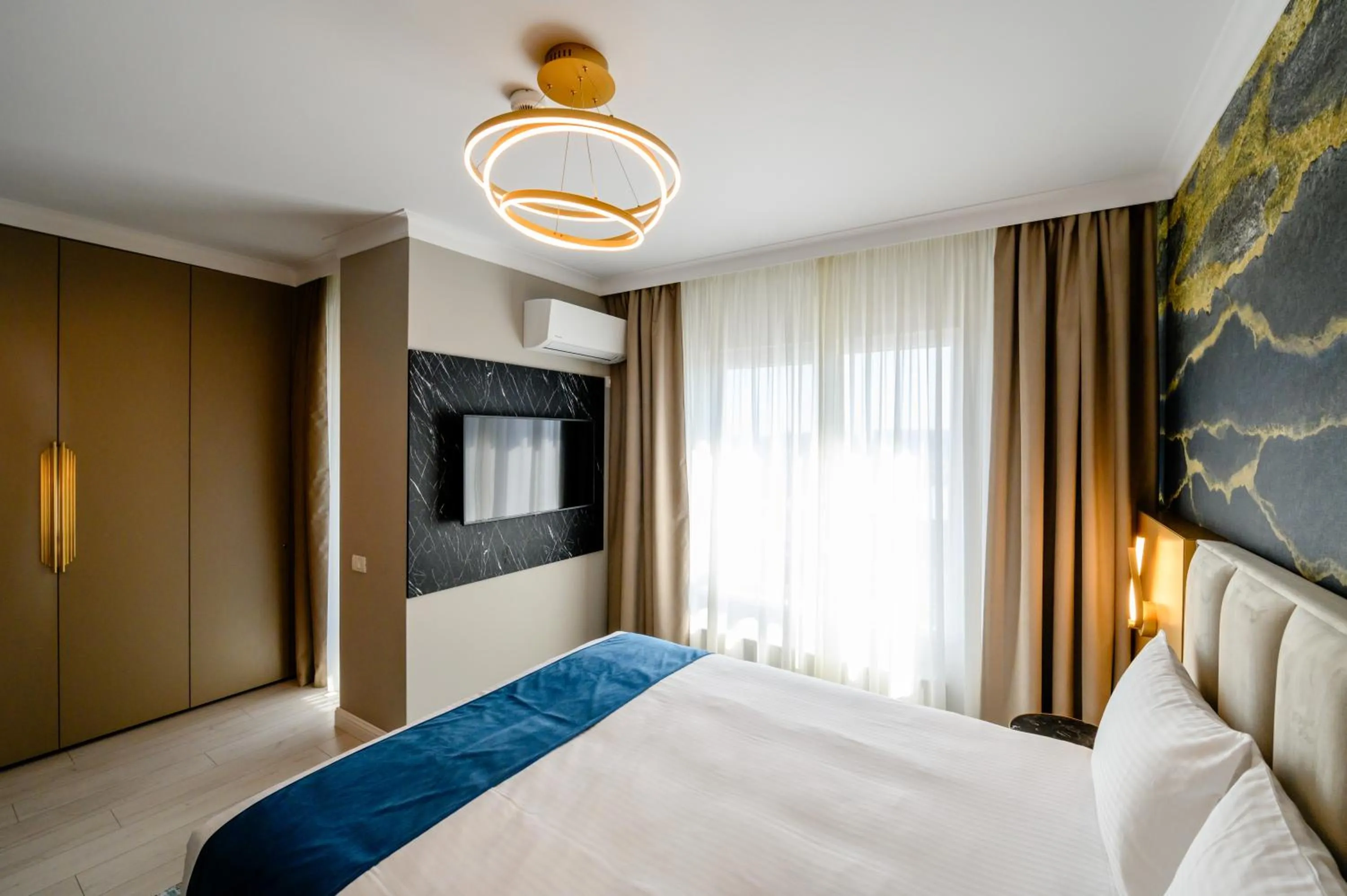 Bed in Elitte Inn & Suites