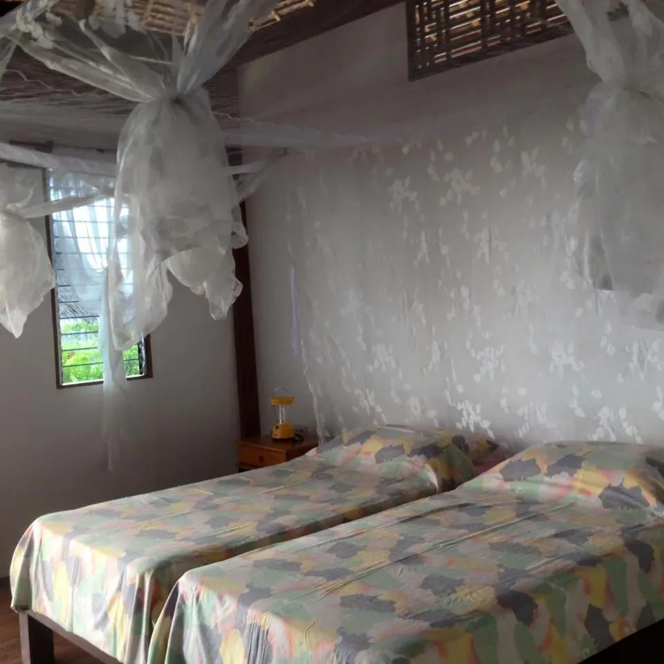 Bed in Liwayway sa Bohol Pamilacan Resort