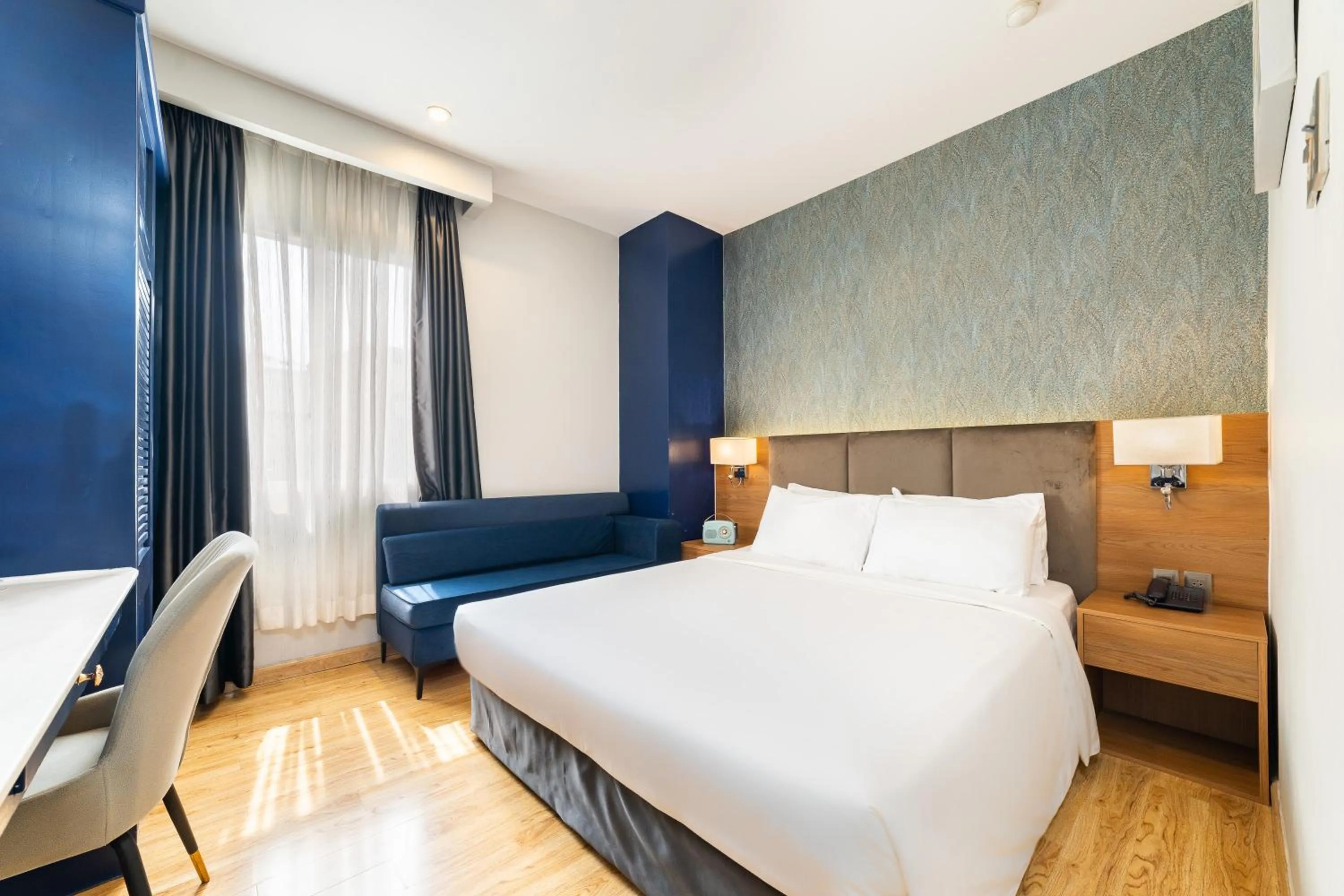 Bed in Nicecy NganHa Hotel