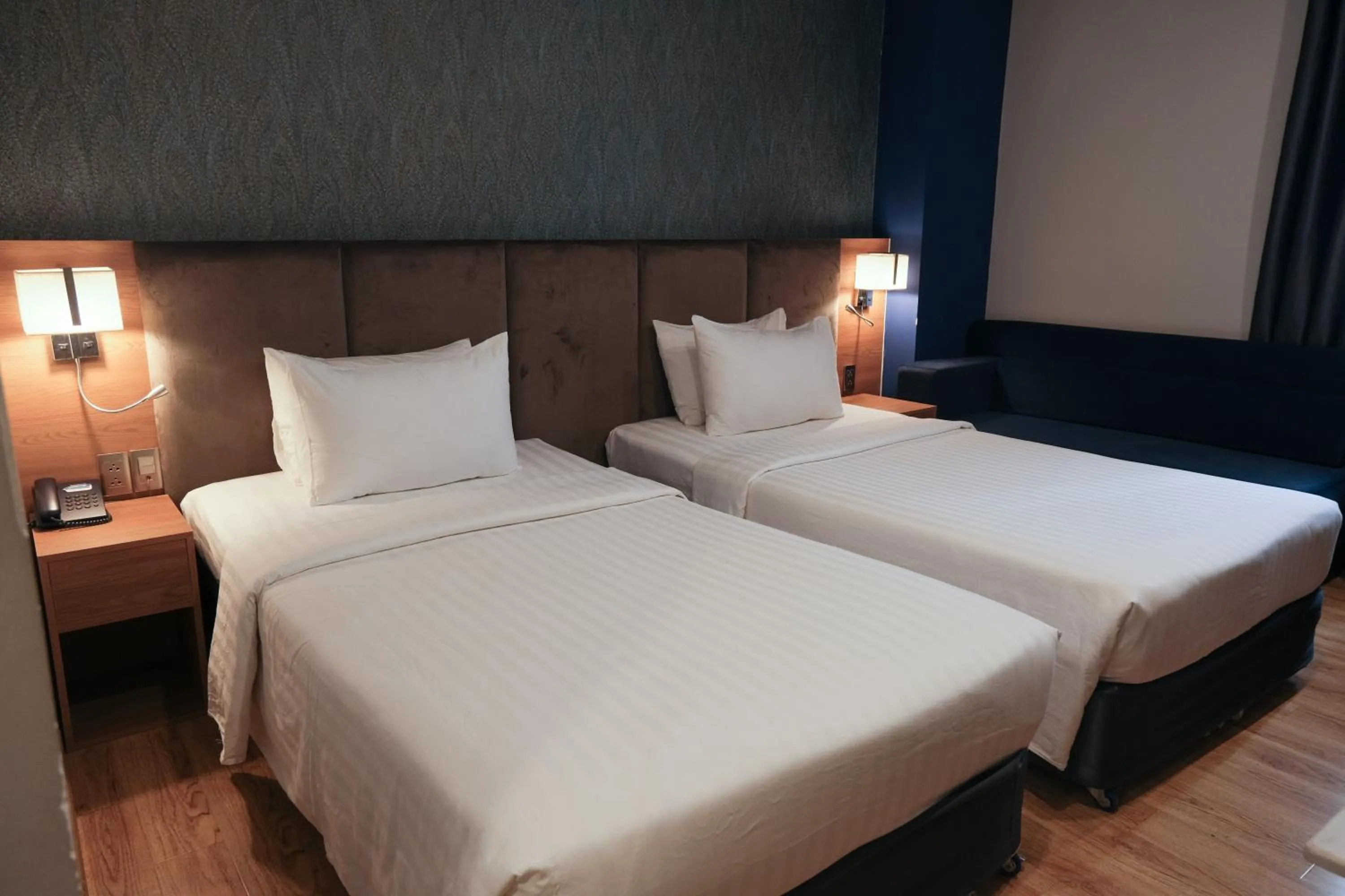 Bed in Nicecy NganHa Hotel