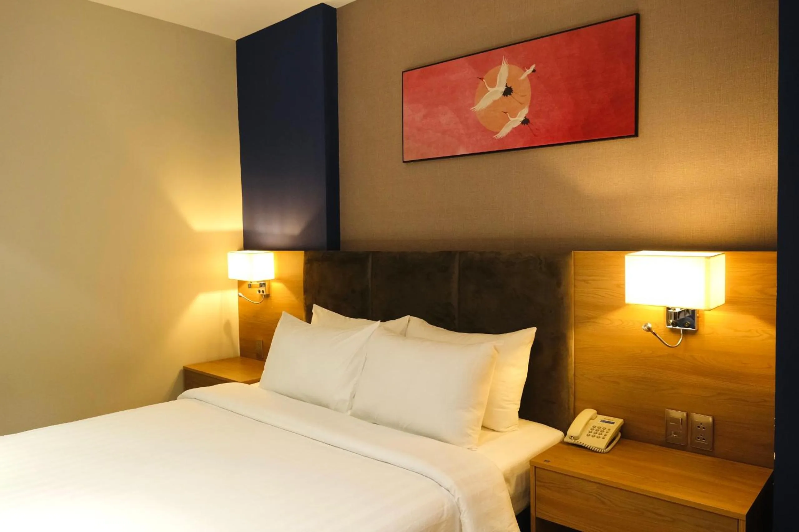 Bed in Nicecy NganHa Hotel