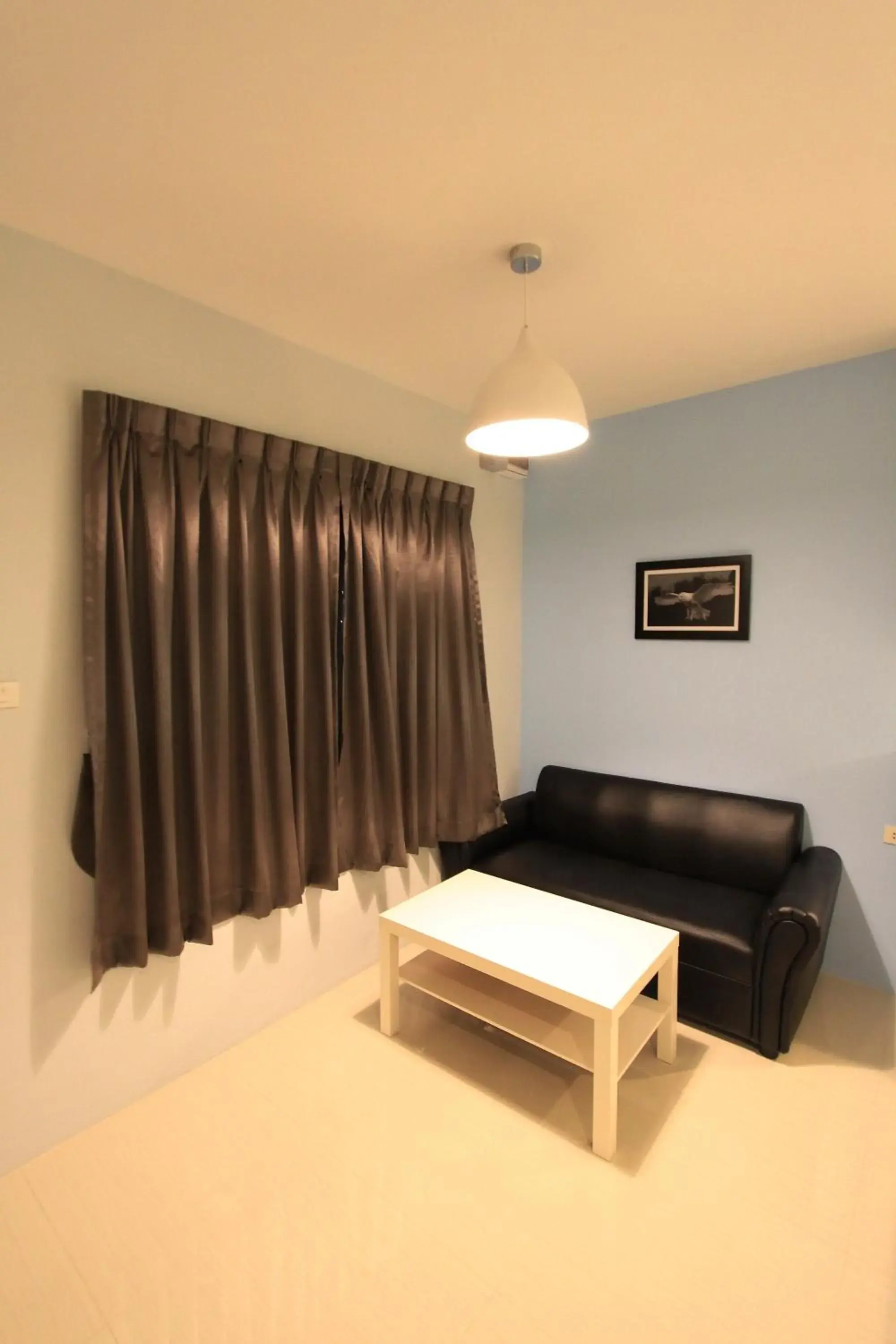 Seating area in Eazy Motel B.a.n.g.n.a Seating area in Eazy Motel B.a.n.g.n.a