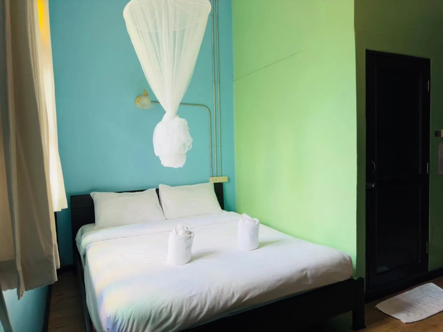 Bed in Mi Casa Thaphae Chiang Mai