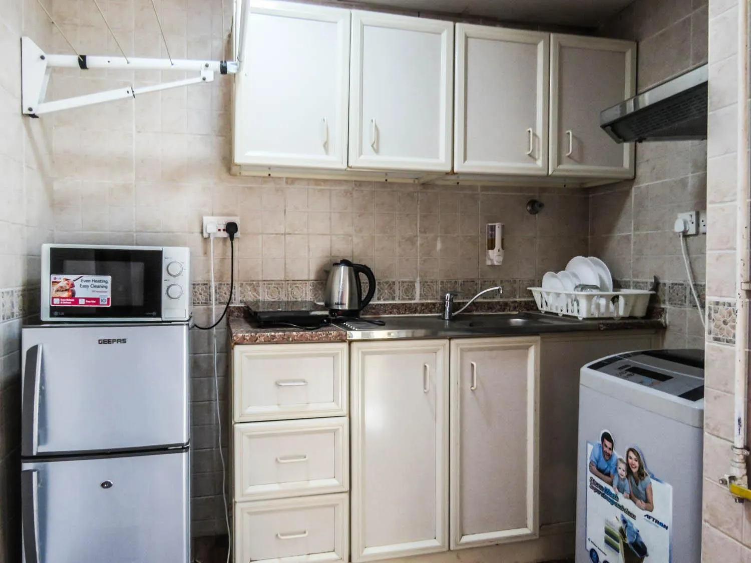 Kitchen or kitchenette in Al Ferdous Hotel Apartment