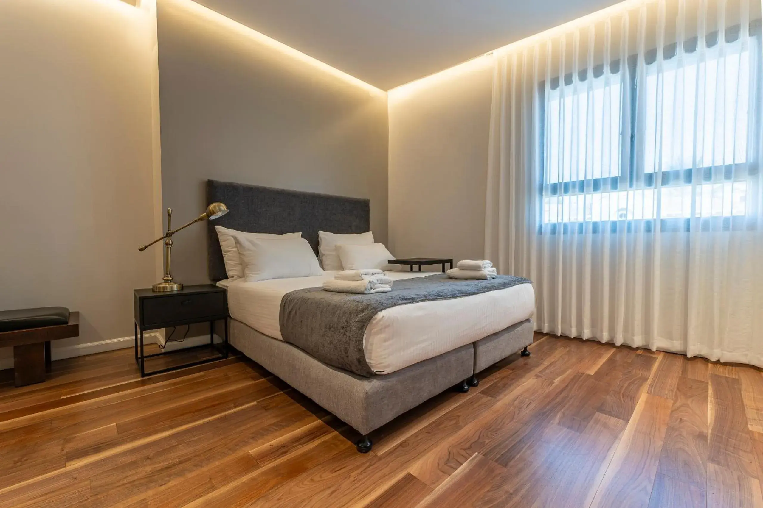 Photo of the whole room, Bed in Hematian Hotel by Effy Photo of the whole room, Bed in Hematian Hotel by Effy