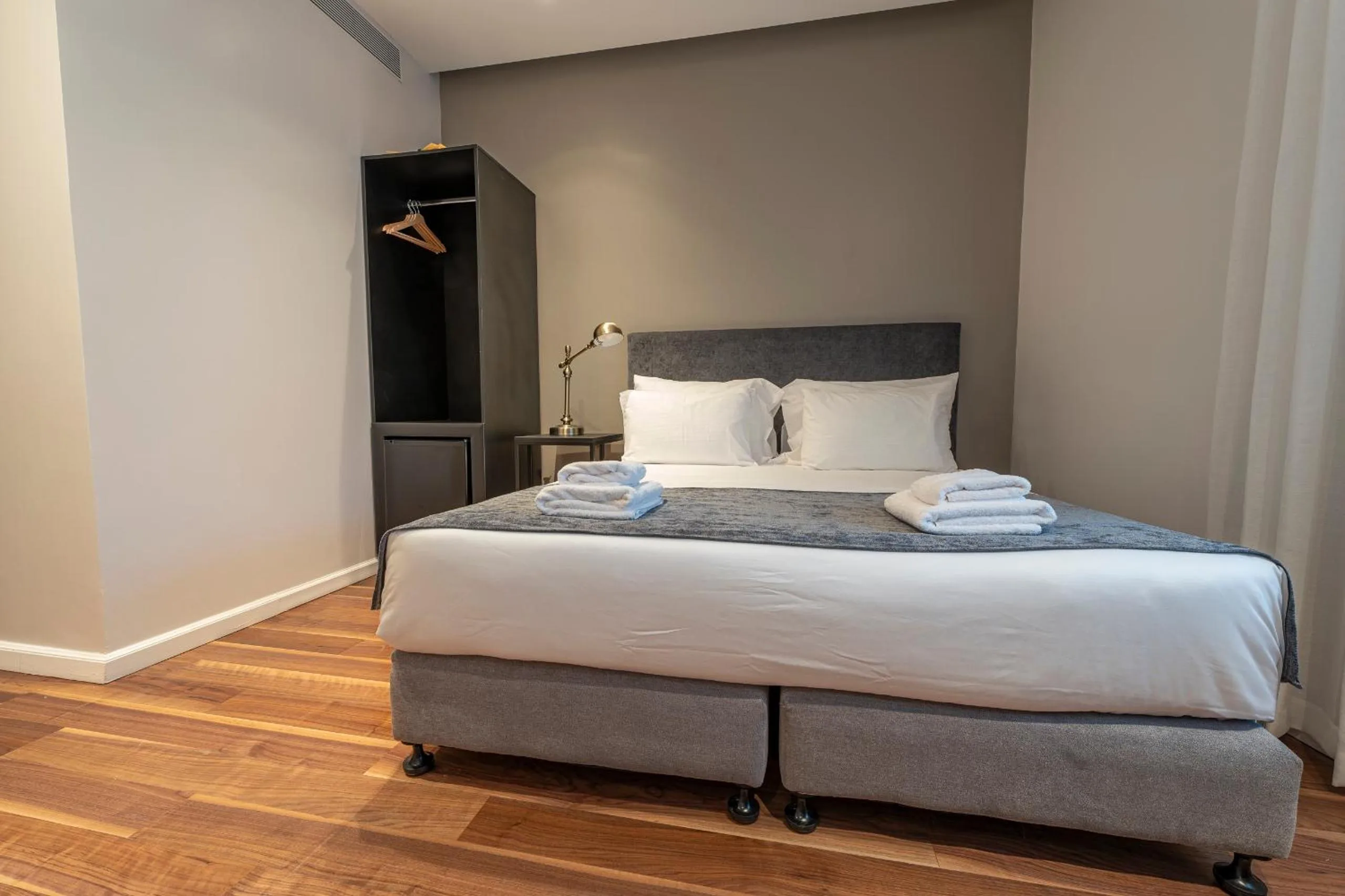 Bed in Hematian Hotel by Effy