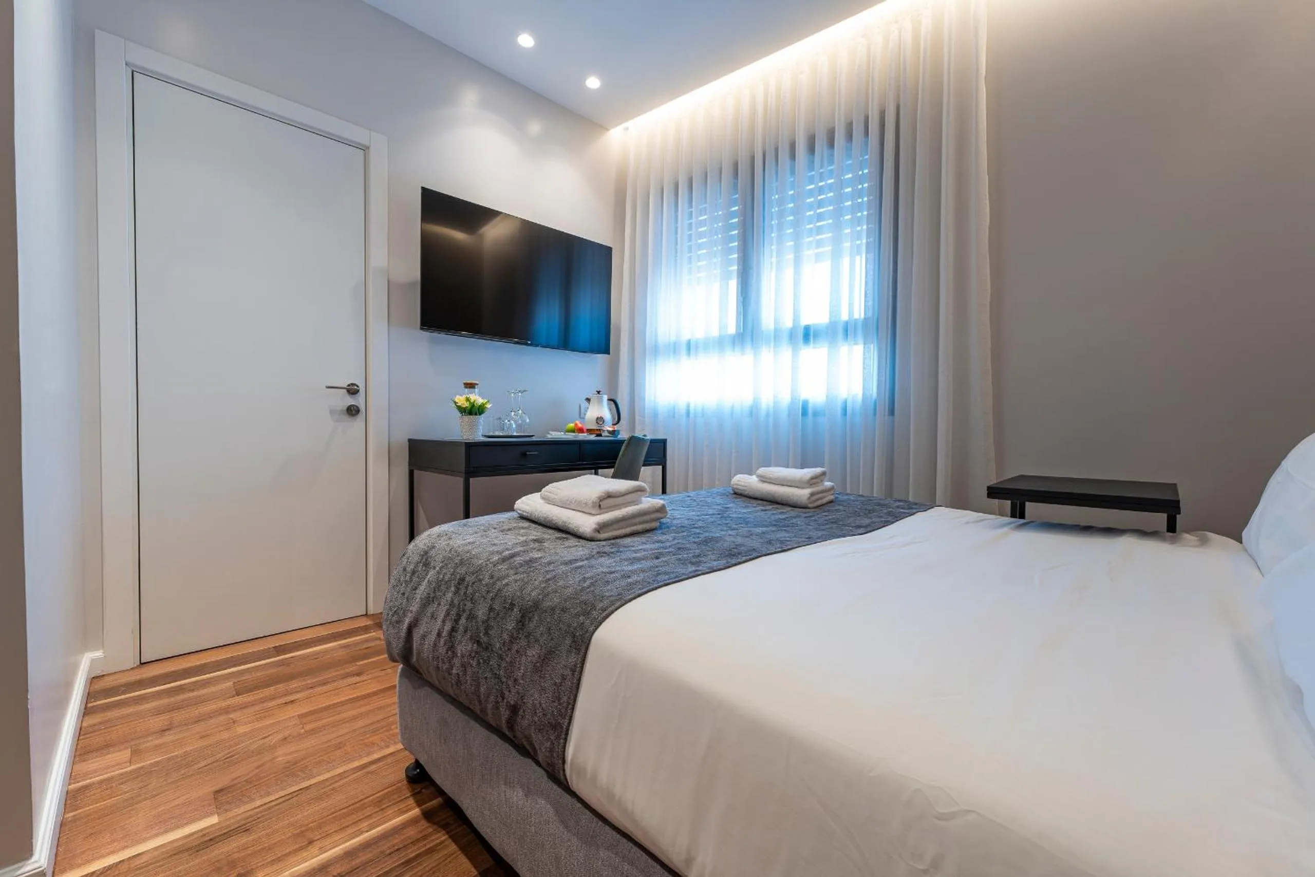 Bed in Hematian Hotel by Effy