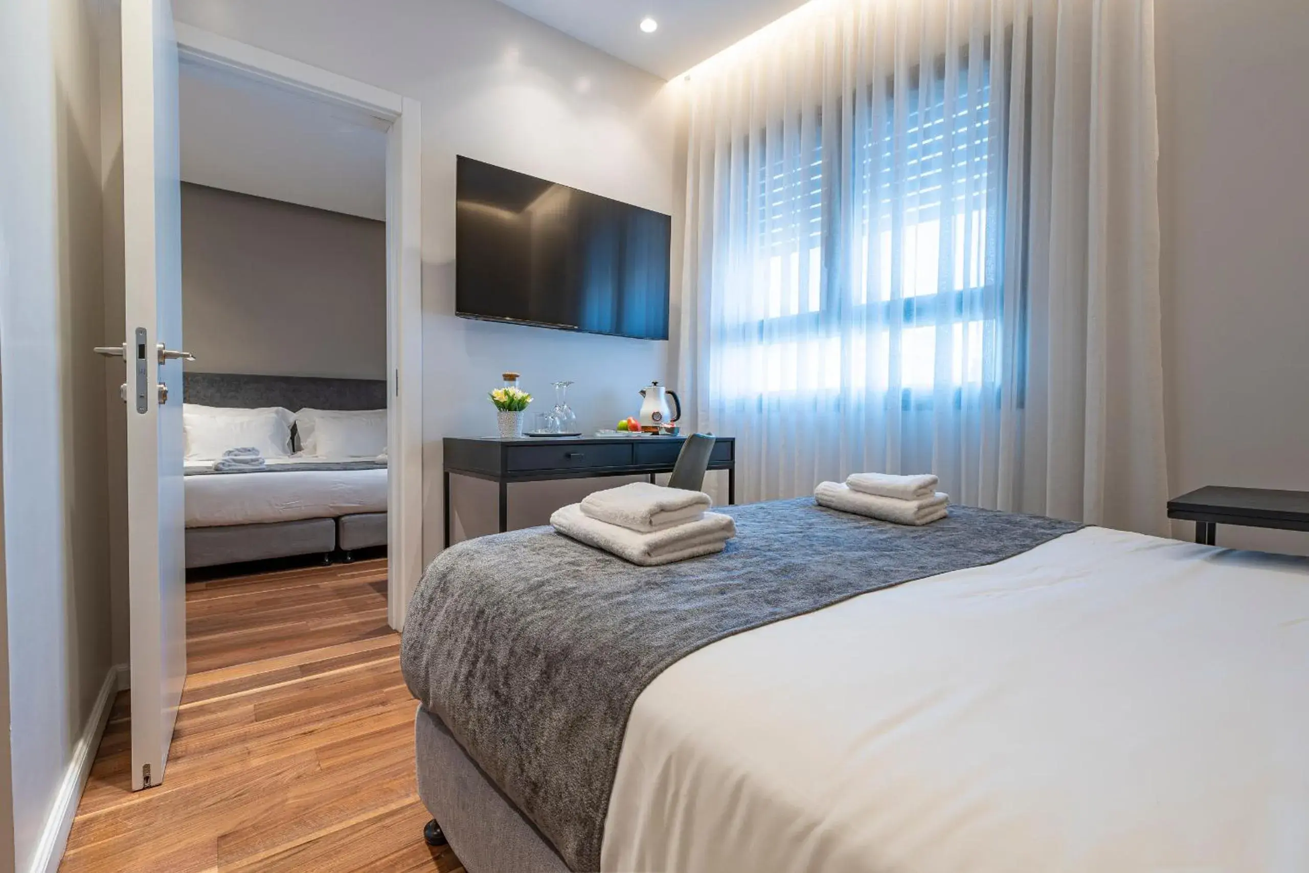 Photo of the whole room, Bed in Hematian Hotel by Effy Photo of the whole room, Bed in Hematian Hotel by Effy