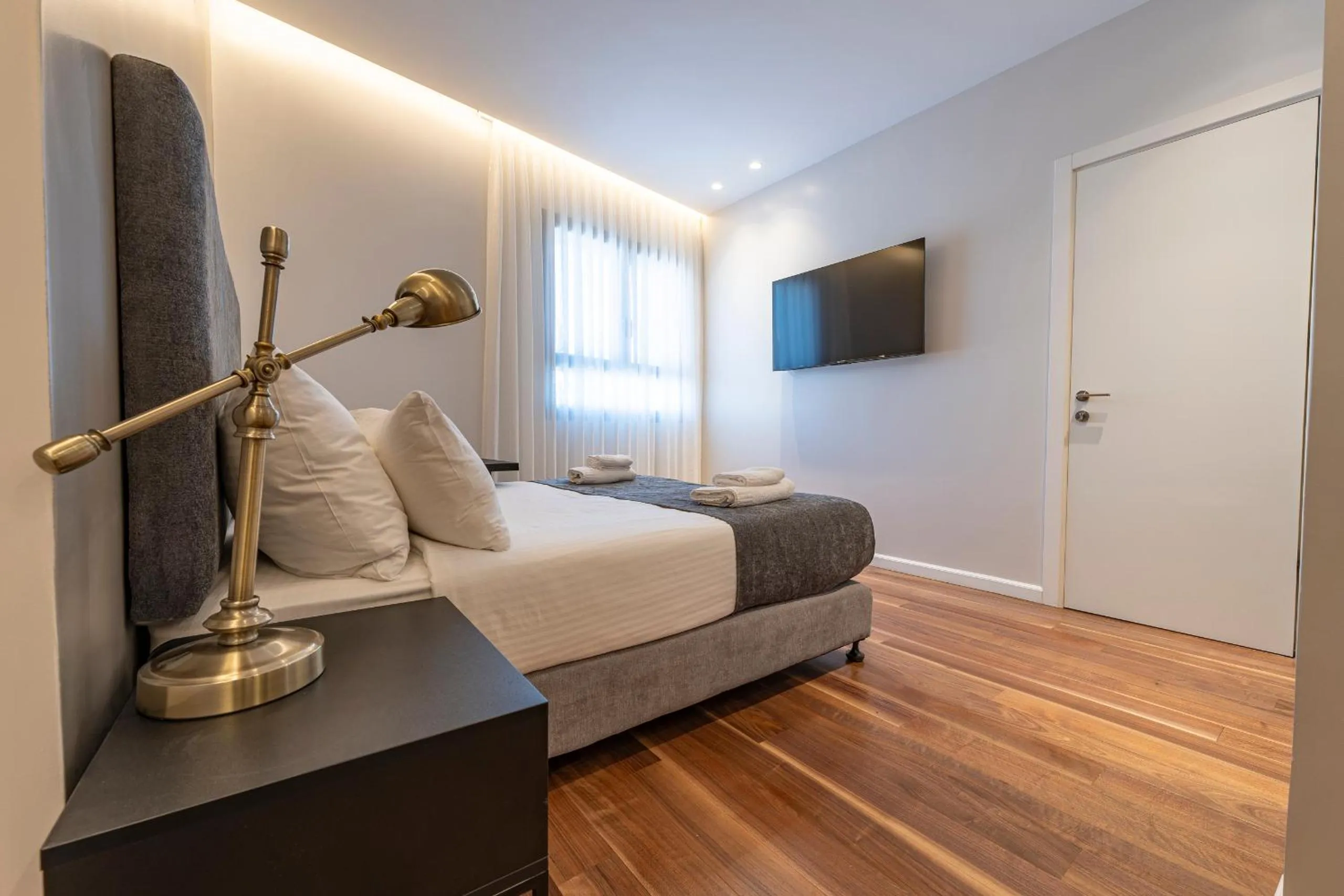 Bed in Hematian Hotel by Effy