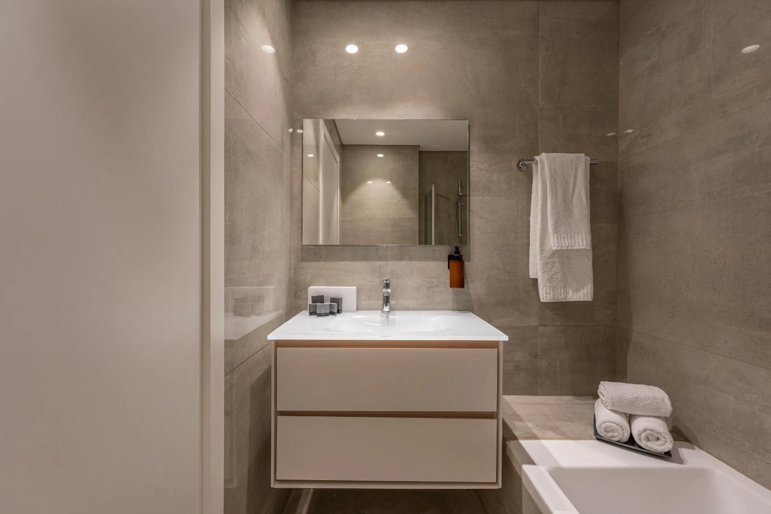 Bathroom in Hematian Hotel by Effy